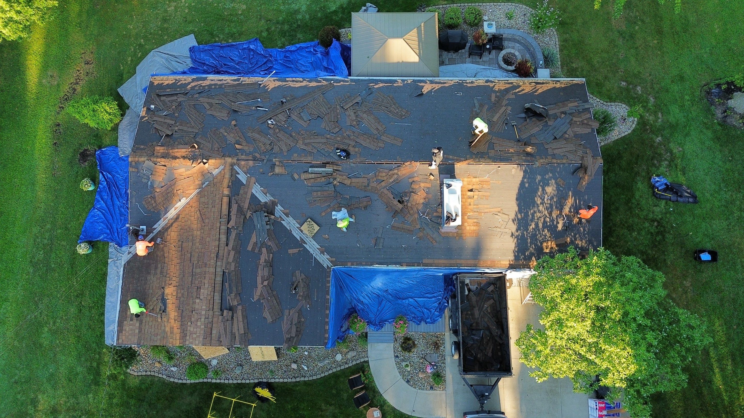 Roof Replacment, Chimney crown  by Know-A-Guy Roofing & Exteriors 