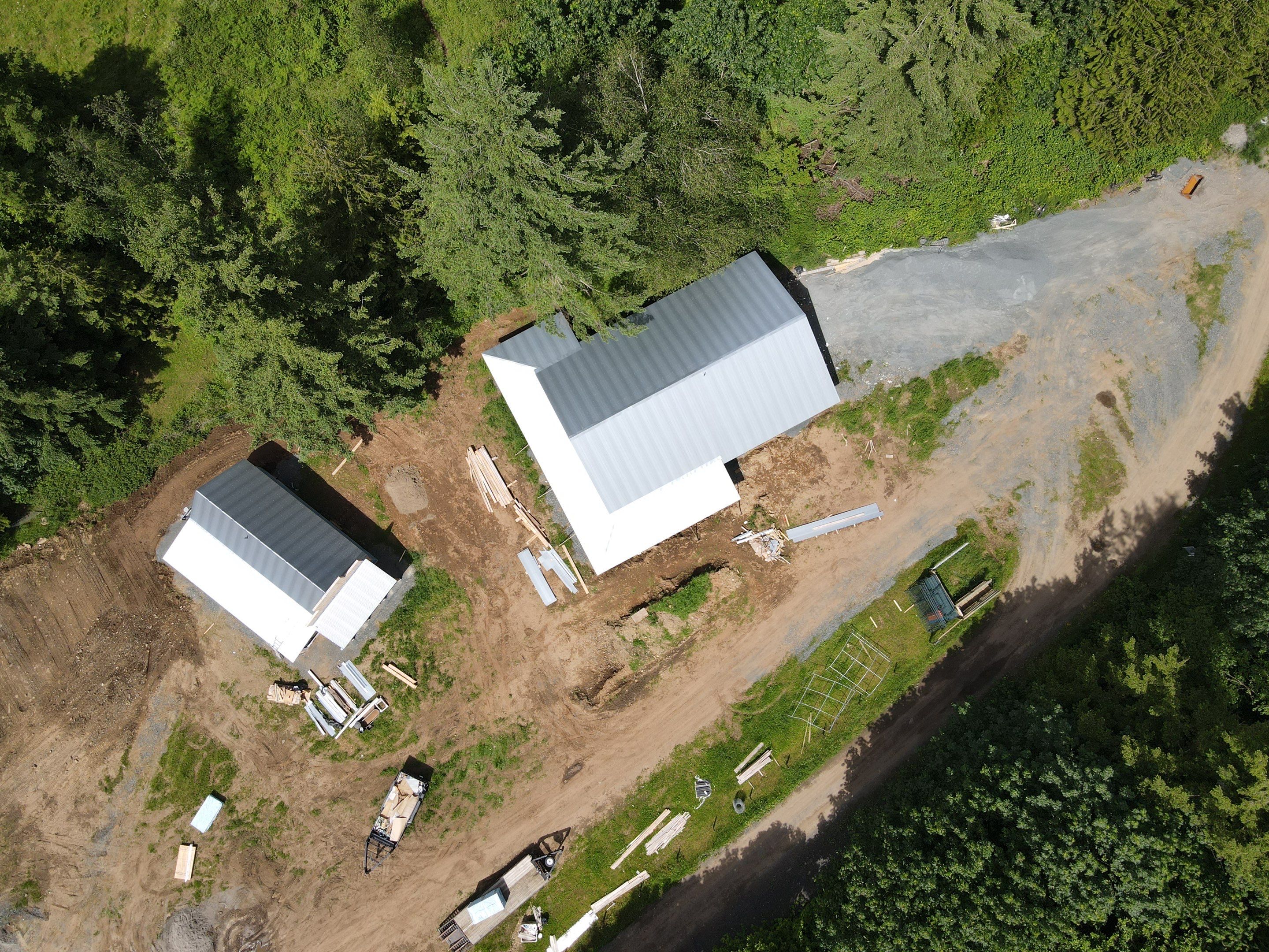 Commercial Roofing Installation using corrugated metal by Top Notch Roofing Inc