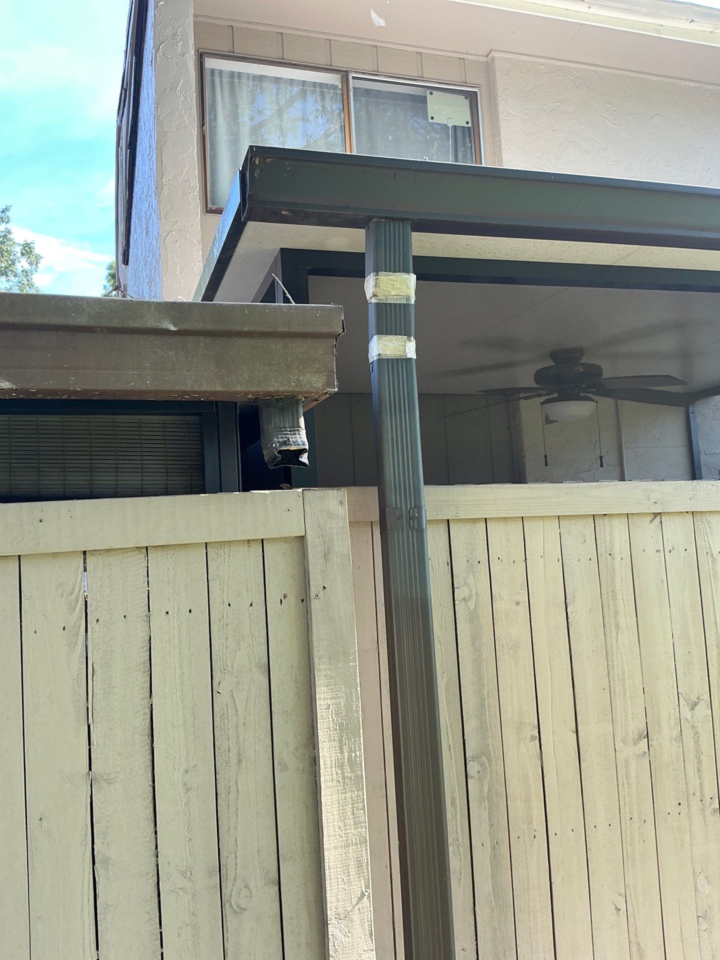 Professional Downspout Installation in Tampa, FL by Gutter Professor by Gutter Professors
