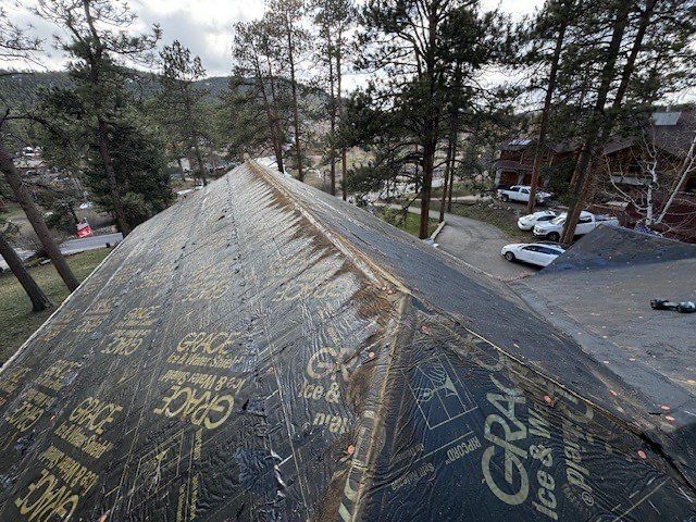Residential Roofing Installation using Standing Seam Metal by Blue Peaks Roofing LLC 