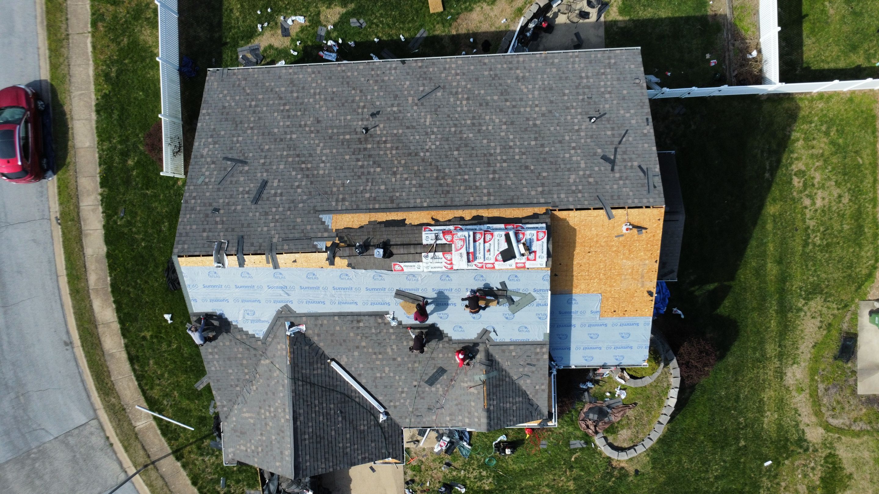 Residential Roof + Gutters & Downspouts Install  by Titan Commercial & Residential Roofing 