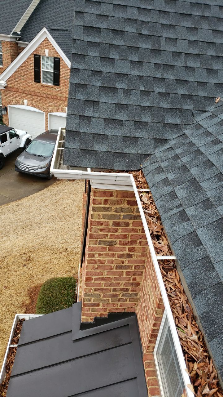 Gutter Cleaning using water by Power Wash Masters LLC