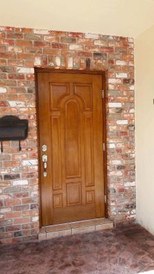 Faux Wood, Fiberglass Entry Door Replacement with Arched Panels in Fort Lauderdale