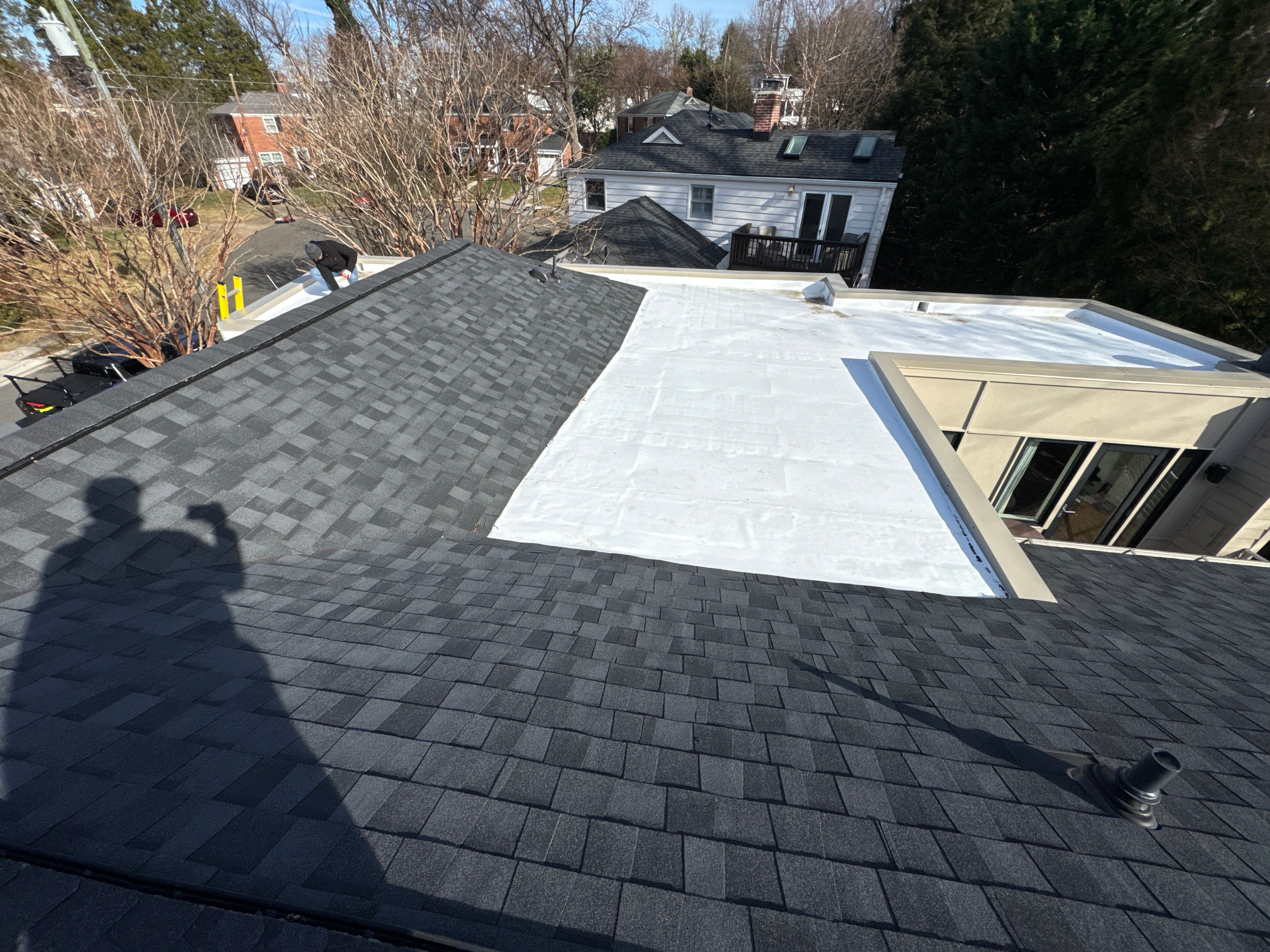 Residential Roofing Installation using Shingle and Flat Roof Combo by USA Storm Roofing and Construction Group