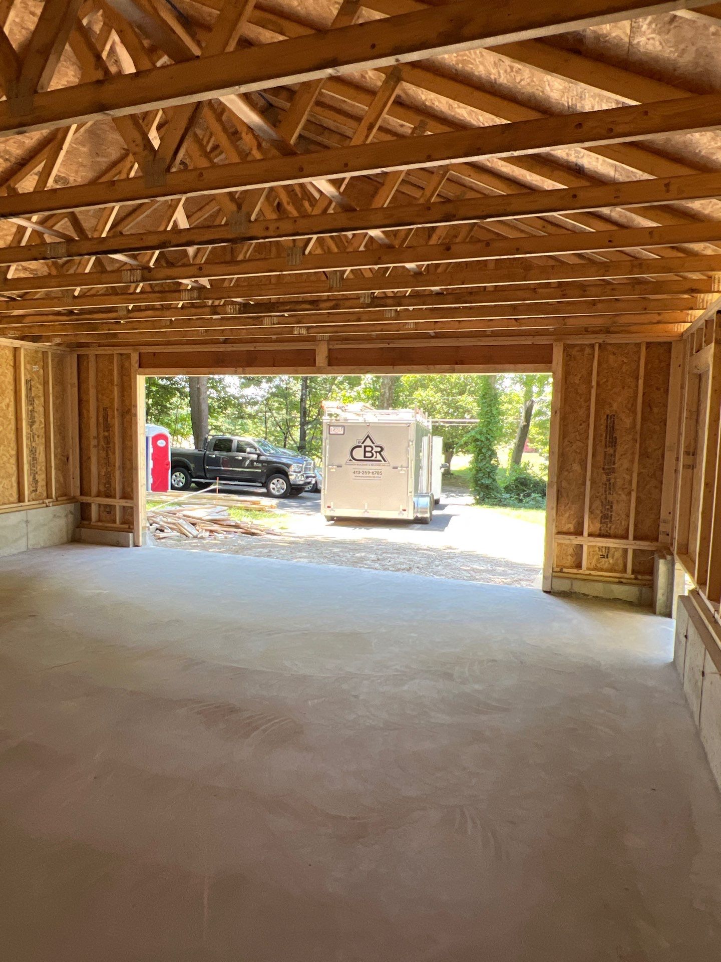 Garage using LP SmartSide Panel Siding by Chagnon Building & Remodeling LLC