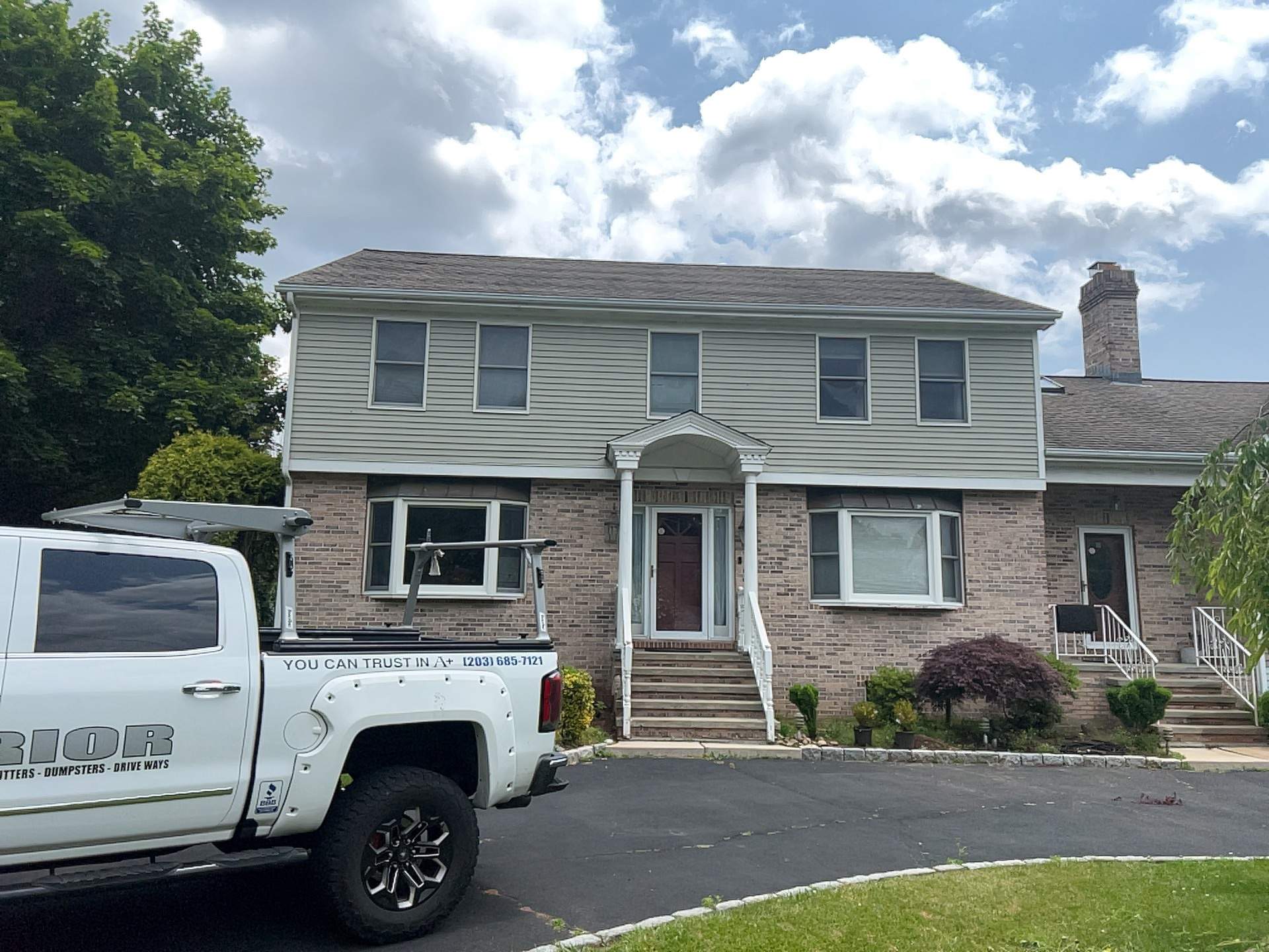 Siding Installation using Mainstreet Colonial & White gutters by A Plus Exterior