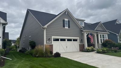 Turtle Shell gutter protection installation in Wheaton, IL 60189, photograph 3