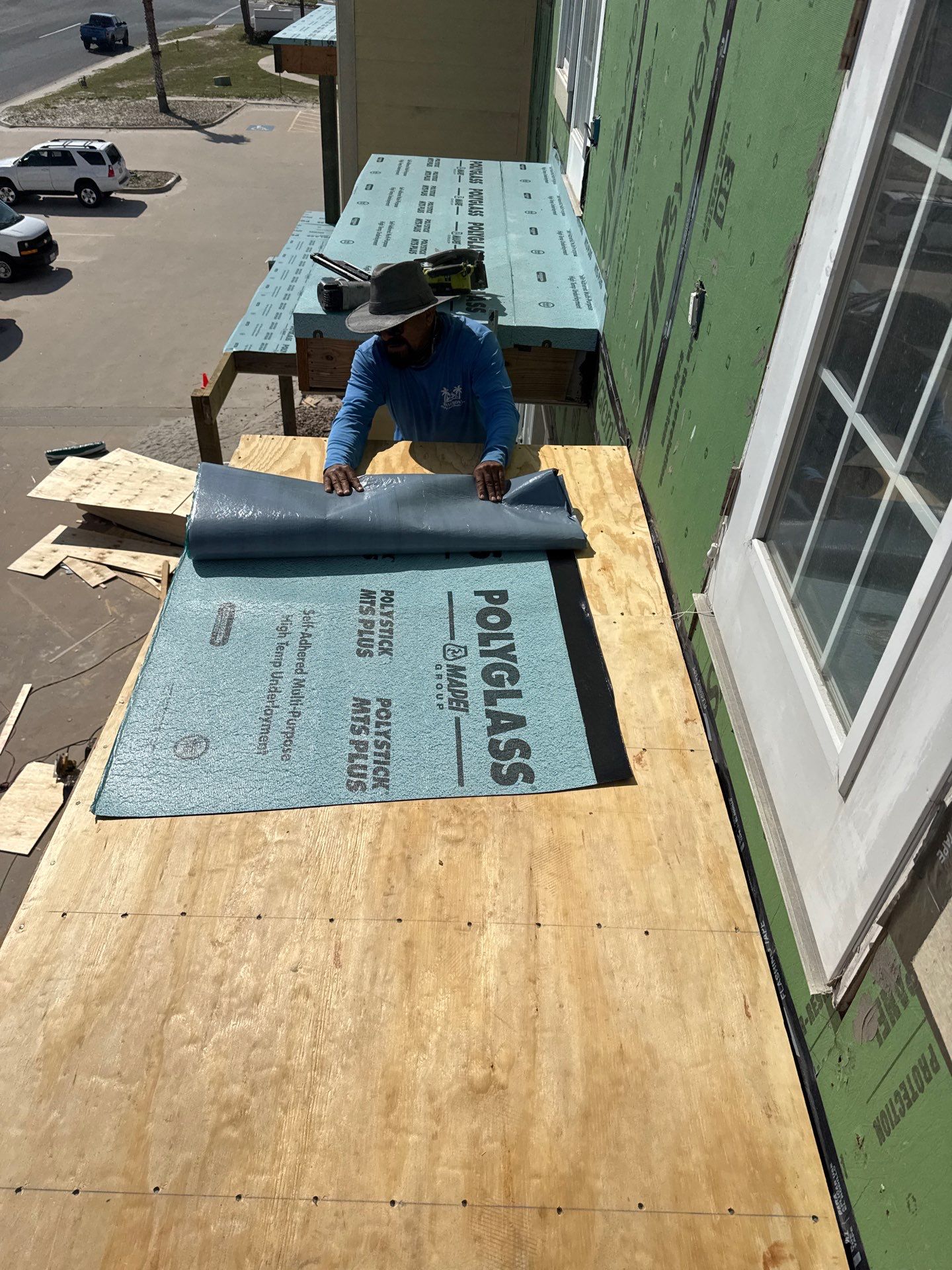 Walk Out Patio Cover by Bayfront Roofing and Construction