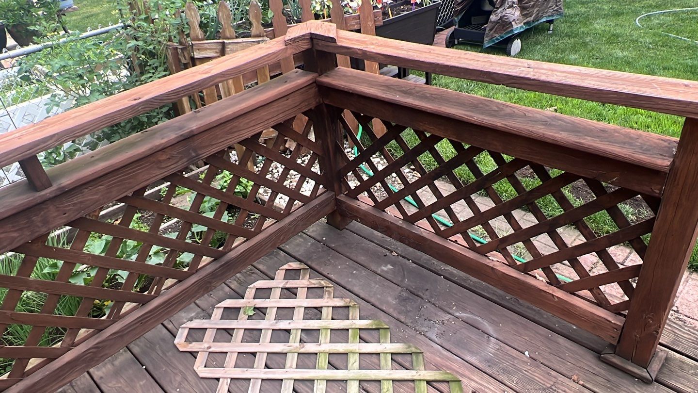 Wood cleaning and staining using Armstrong cloark oil stain by Northern Power Washing LLC.