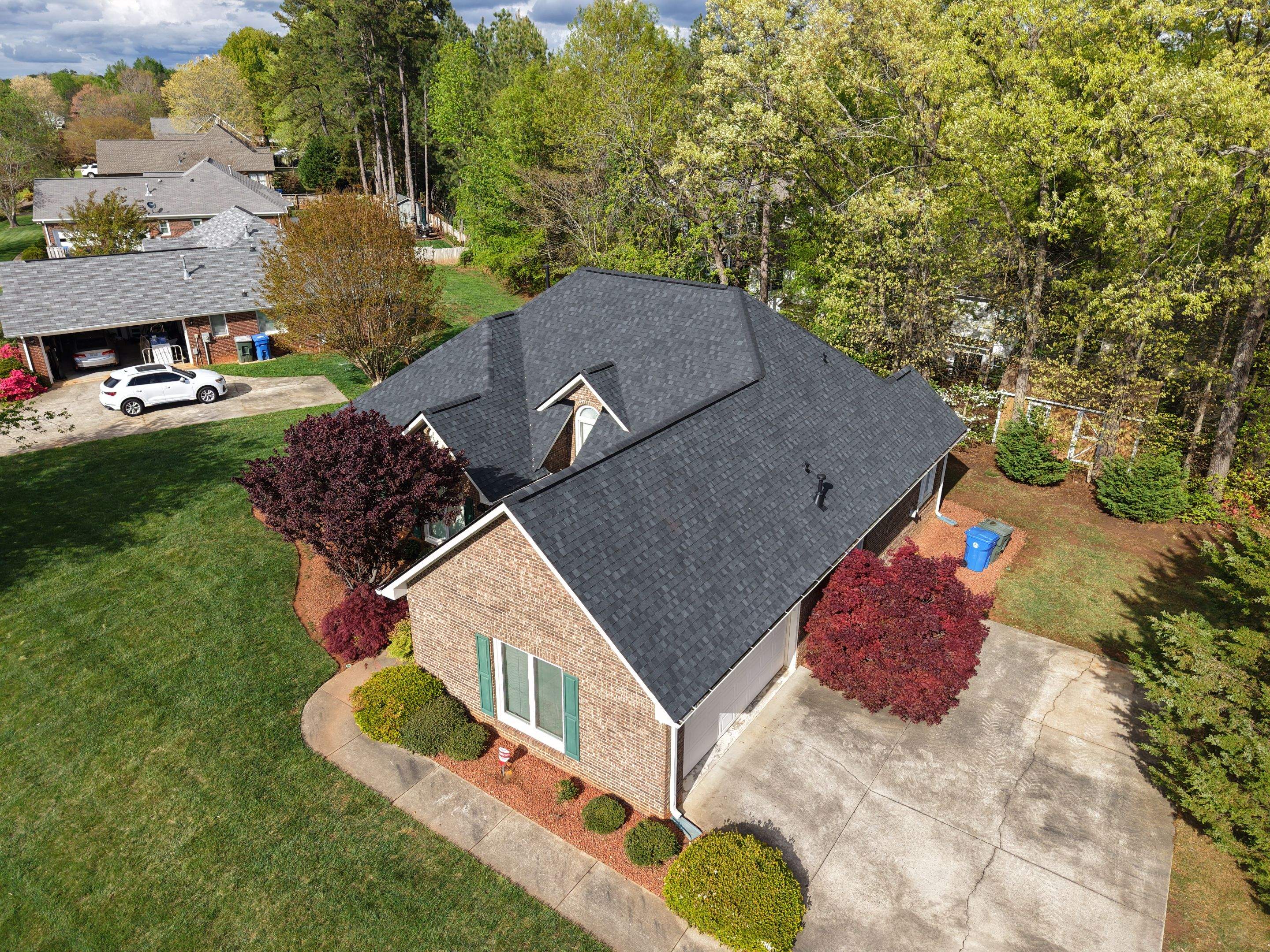 Residential Roofing Installation using TAMKO TITAN XT Rustic Black by RISE Roofing & Restoration, LLC