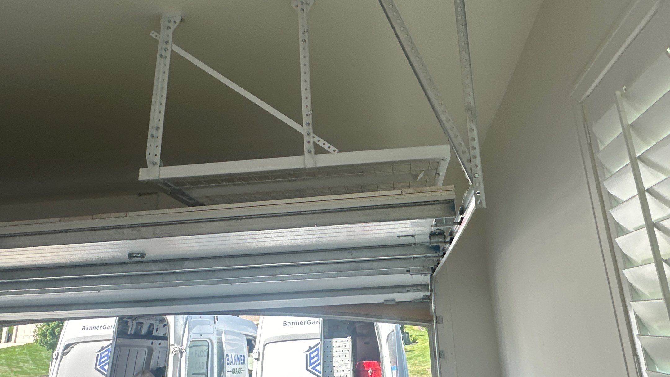 New bike storage for Jason E. along with some overhead racks  by Banner Garage