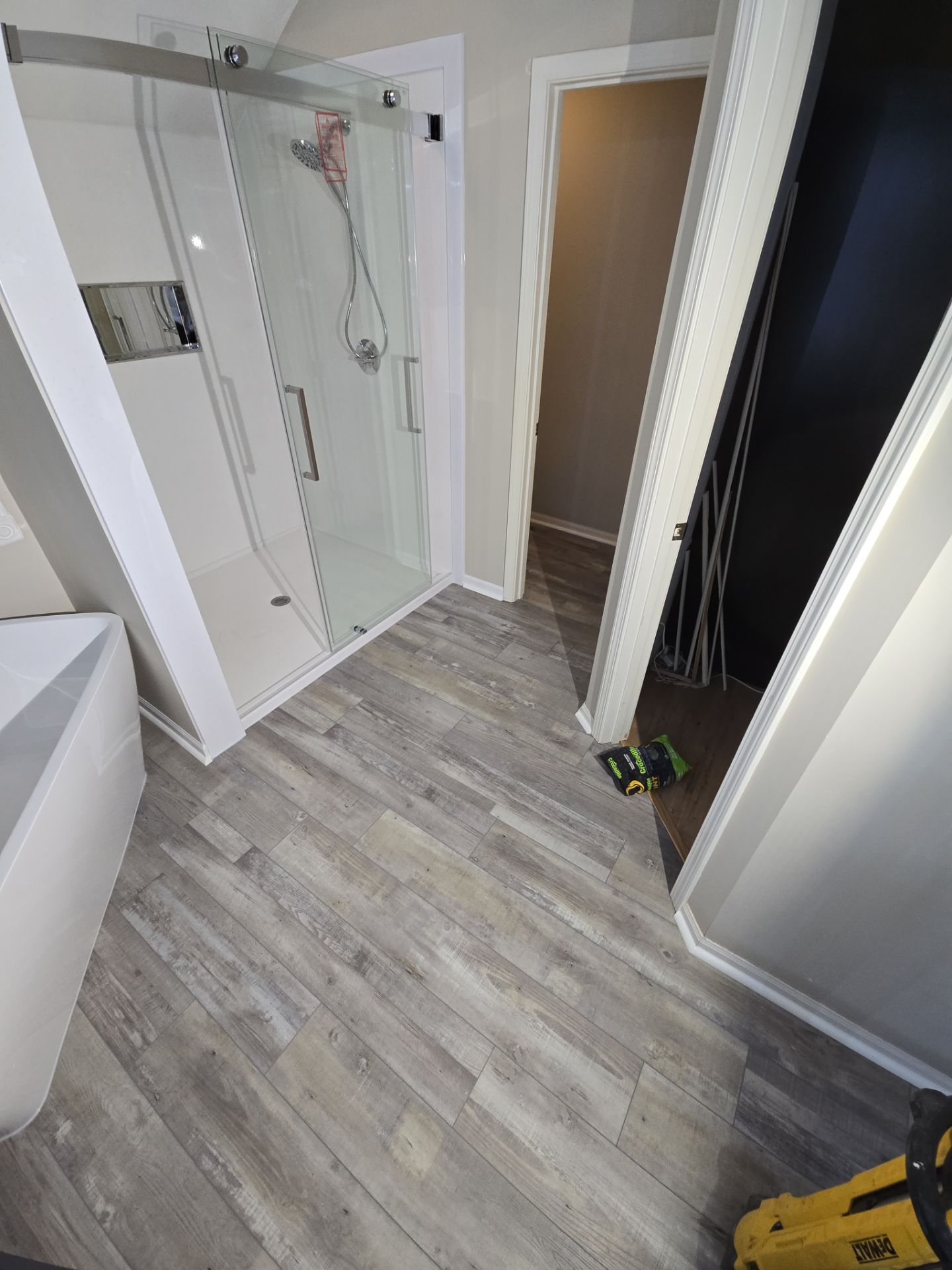 Full bathroom remodel with Artus lighted mirrors, Waltz bathtub and Mercury doors by The Shower Company