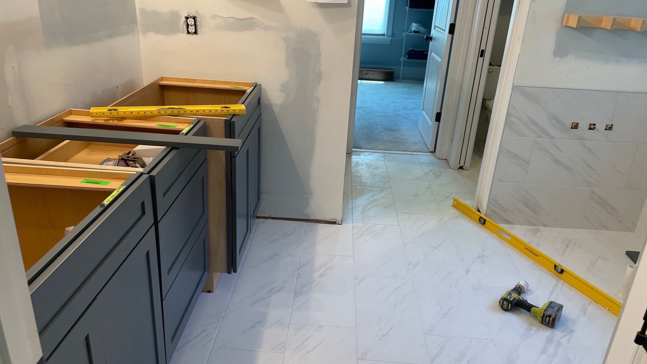 Bright Bathroom Remodel with Wall Removal, Stand Alone Tub and New Vanity by Footprints Floors of Coastal Carolina