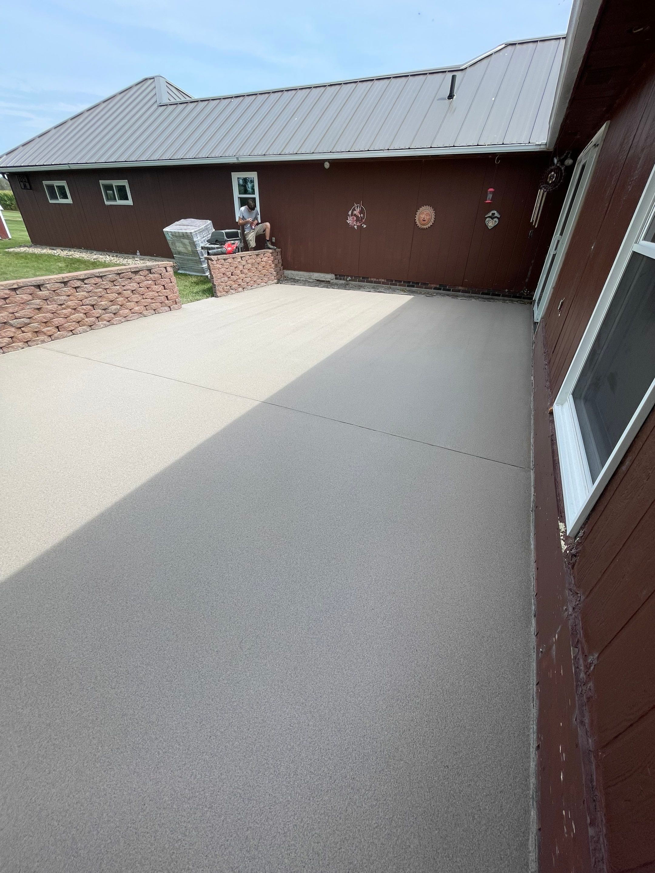 Concrete Patio Resurfacing and Protective Coating in Winfred, South Dakota by Select Painting, Coatings & Garage Cabinets