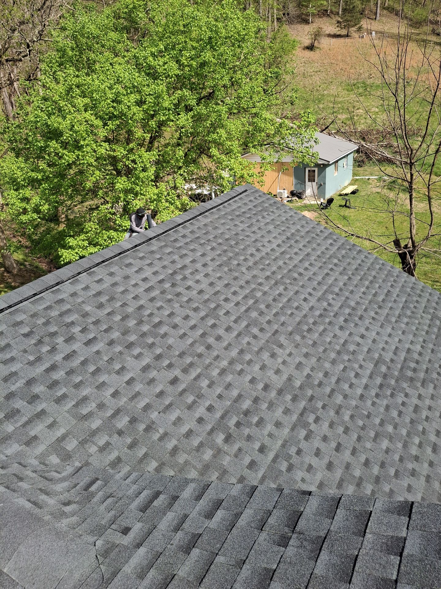 Residential Roofing Installation using GAF Timberline HDZ Charcoal by Rainstoppers Roofing