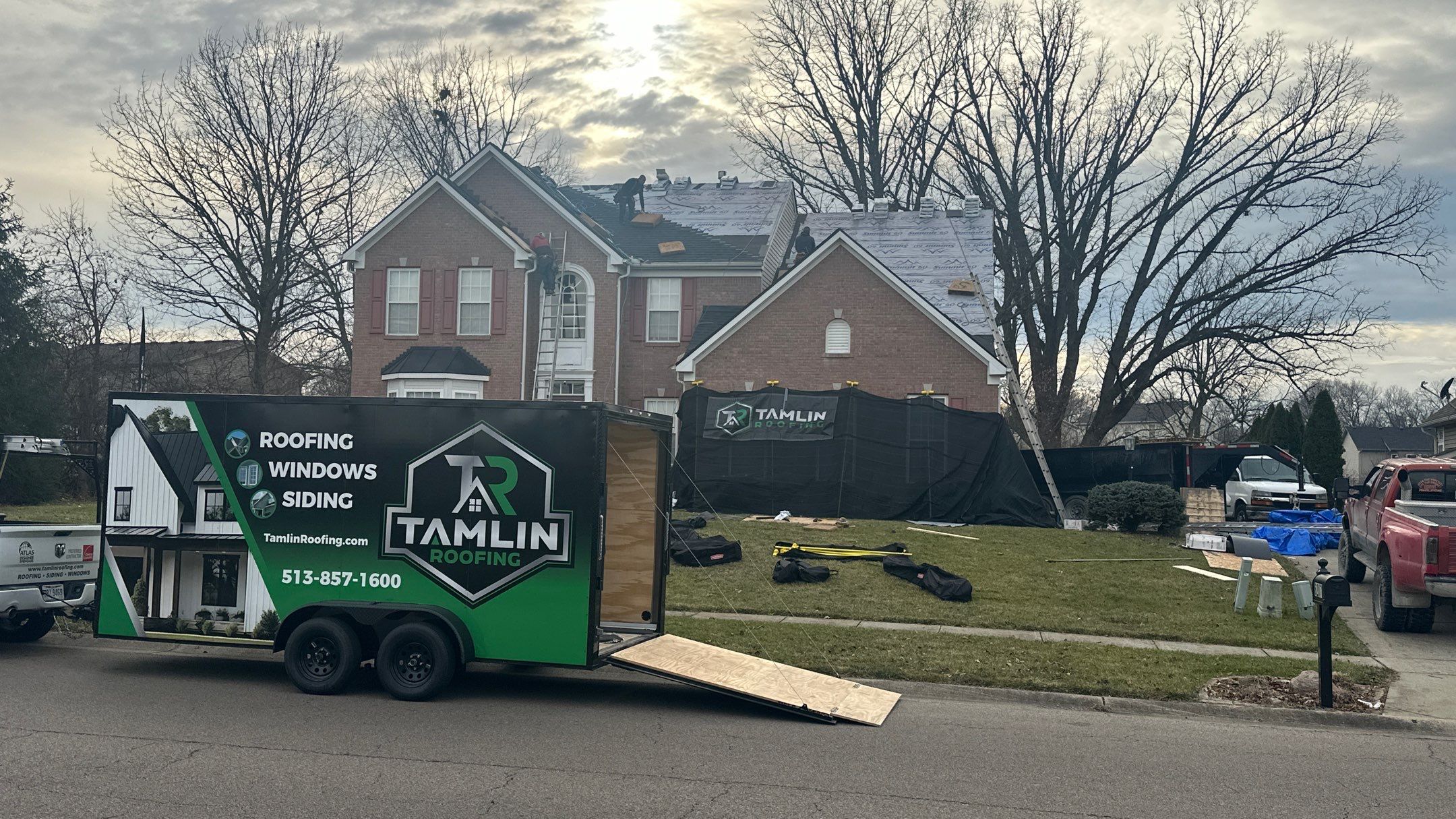 Walden Ponds - Pristine Black and Hydro Flo Gutter Guards by Tamlin Roofing