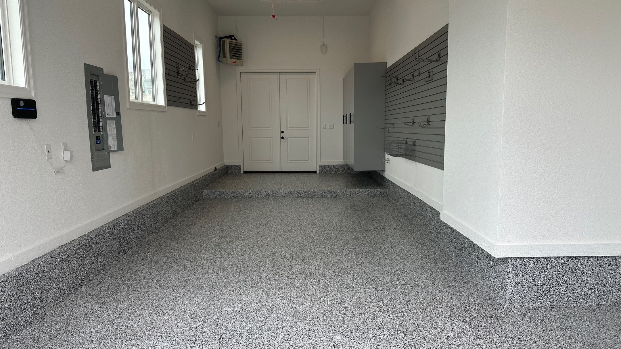 Mike & Pam transformed their garage with a Banner Garage Floor and Cabinets by Banner Garage