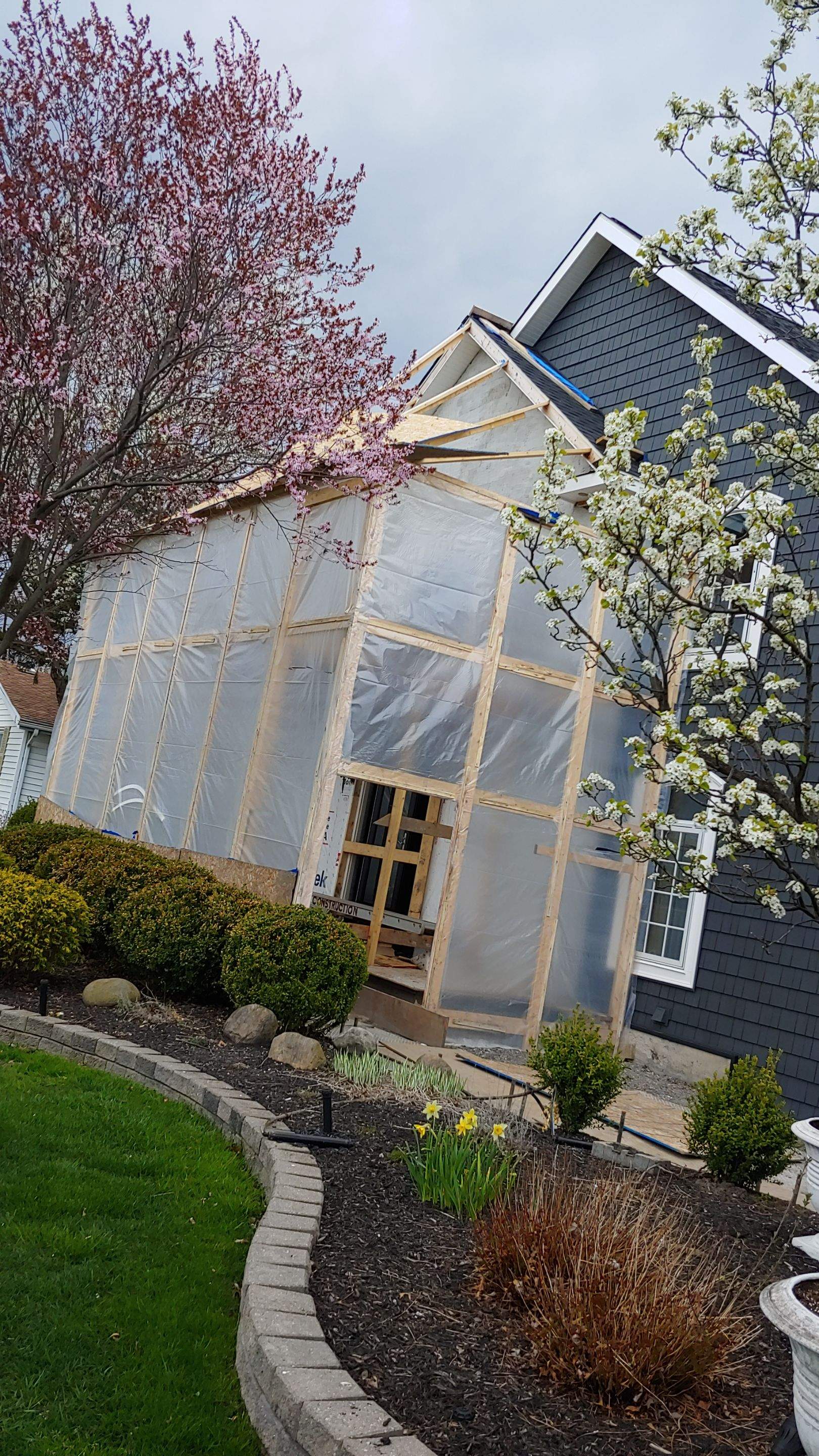 Exterior Renovations- Siding, Concrete, Railings, and Entry Door  by Ivy Lea Construction