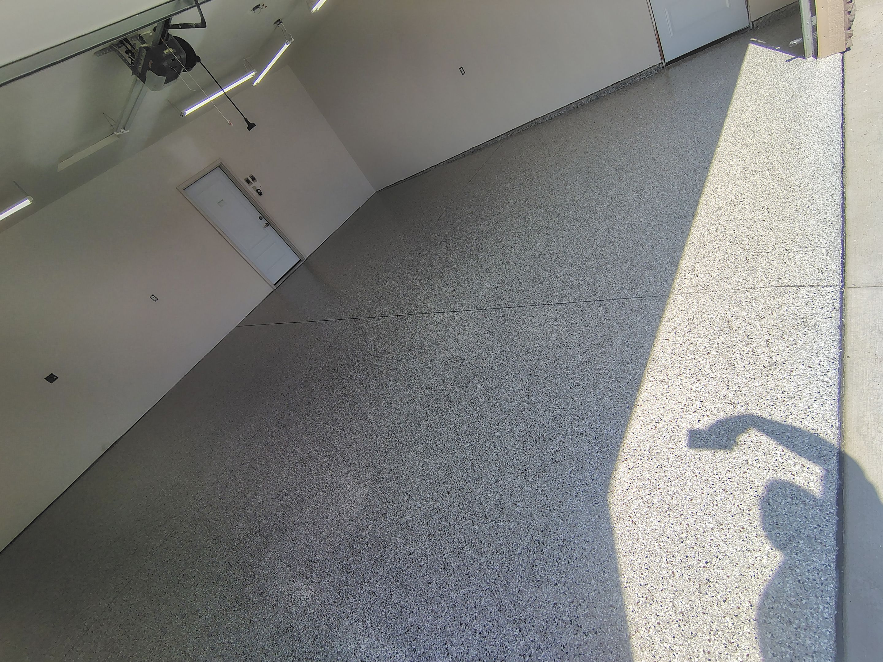 Garage Floor Coating with Coyote Decorative Chip in Tea by Select Painting, Coatings & Garage Cabinets