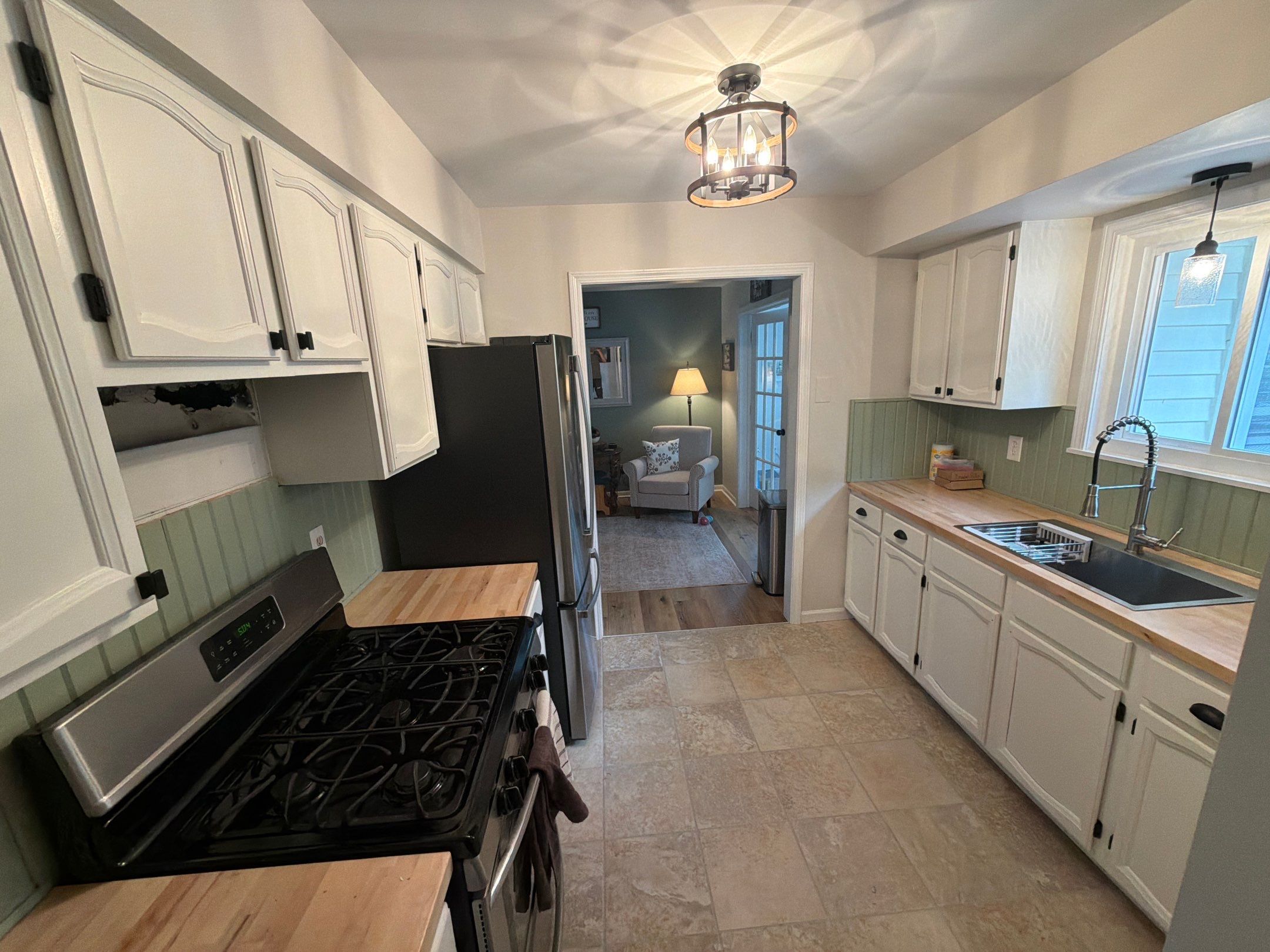Kitchen Cabinet Refinishing and Butcher Block Countertop Installation in Fenton by Top Shelf Painter