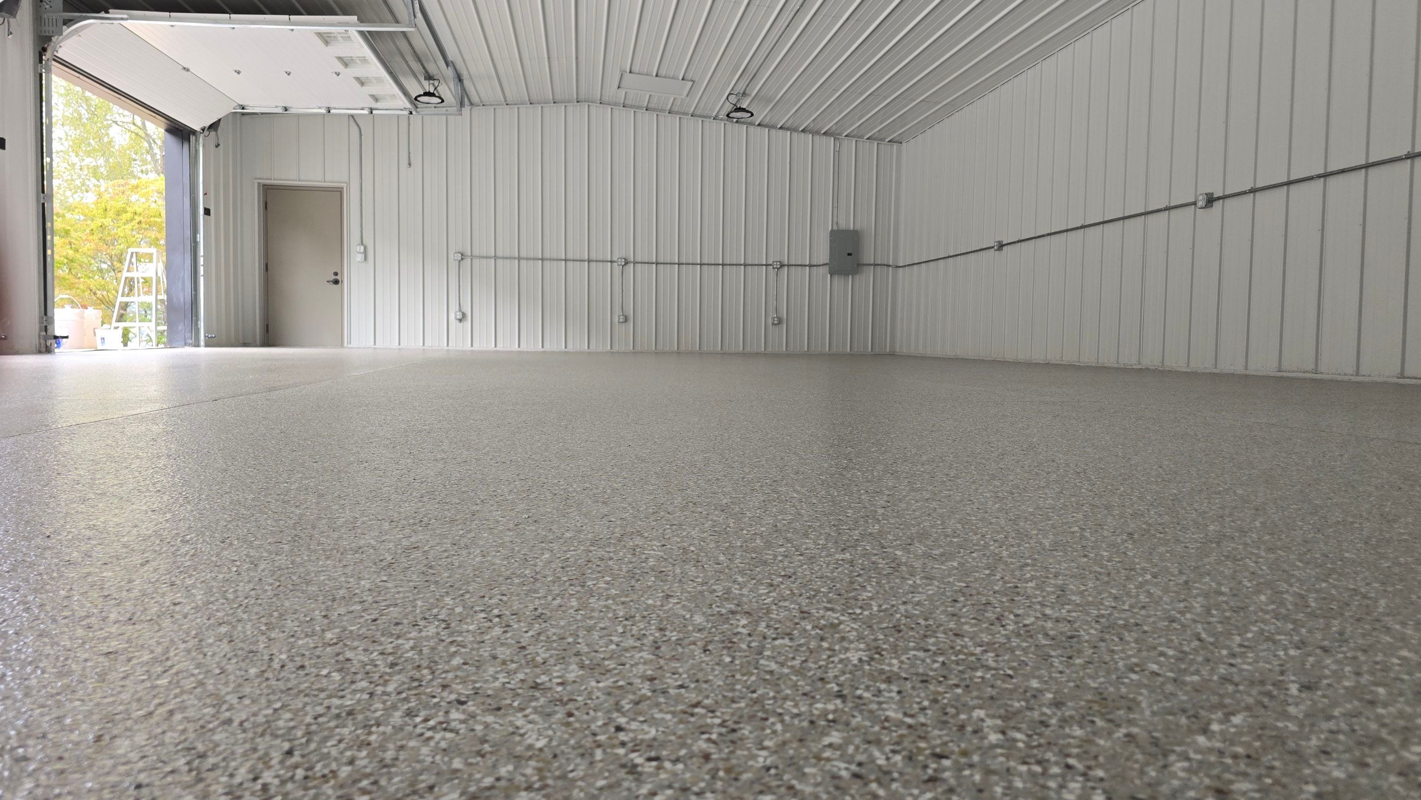 Garage using Creekbed by Elite Floor Solutions
