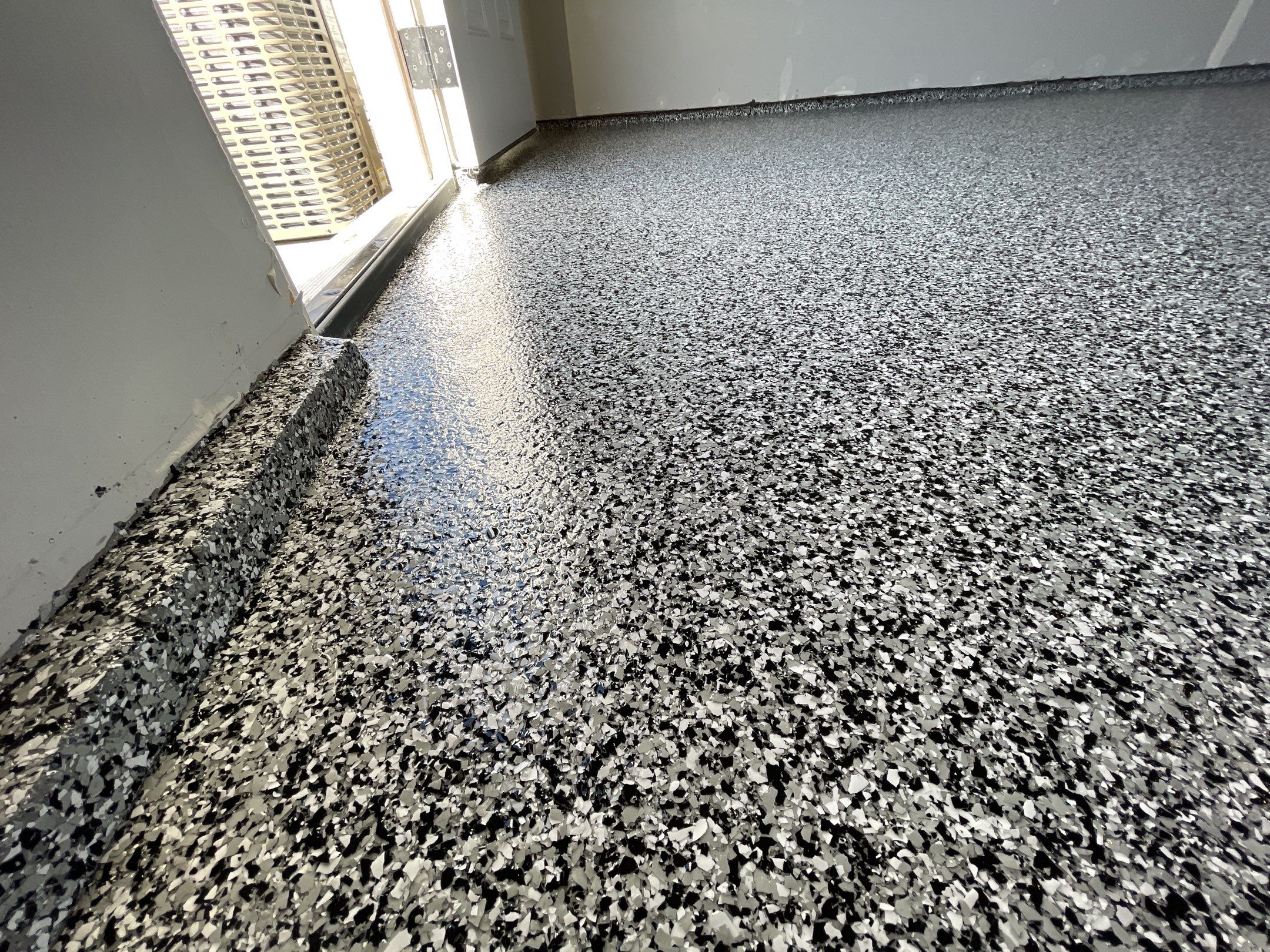 Garage Transformation using Domino by Croc Coatings, LLC