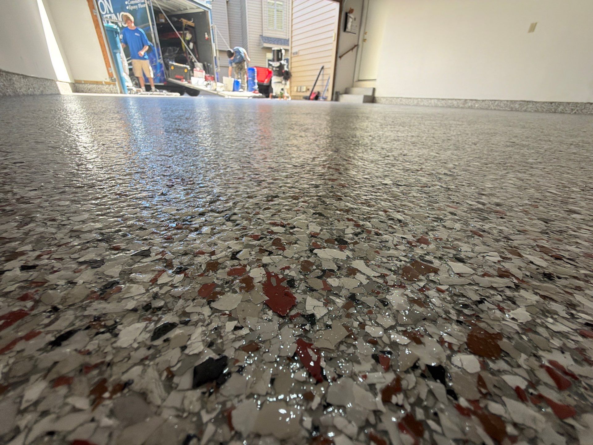 Custom Epoxy Flake Floor Coating and Ceiling Repair in Muskegon by Gordon Painting