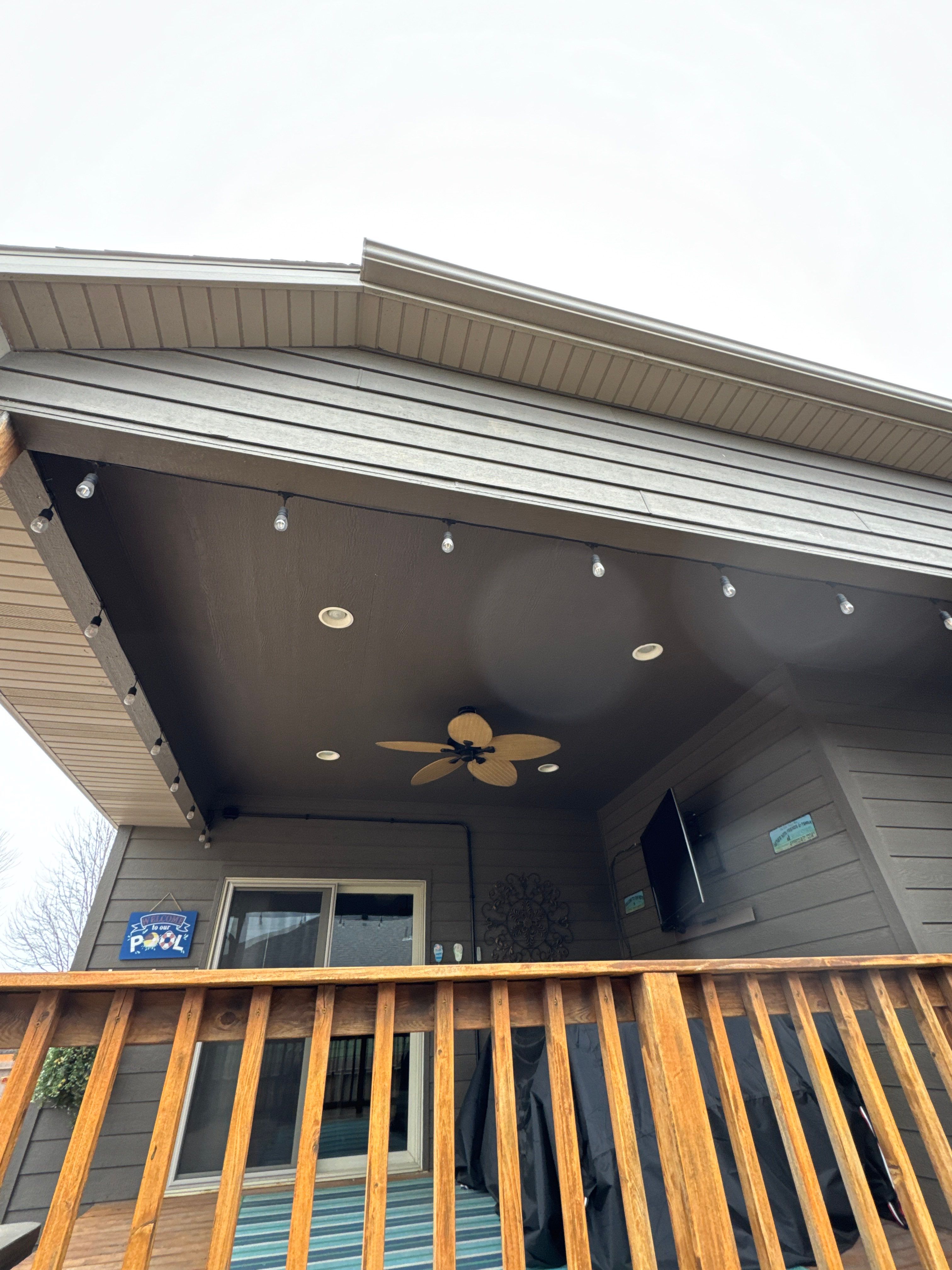 Sioux Falls Residential Exterior Update and Flagstone Pool Deck by Select Painting, Coatings & Garage Cabinets