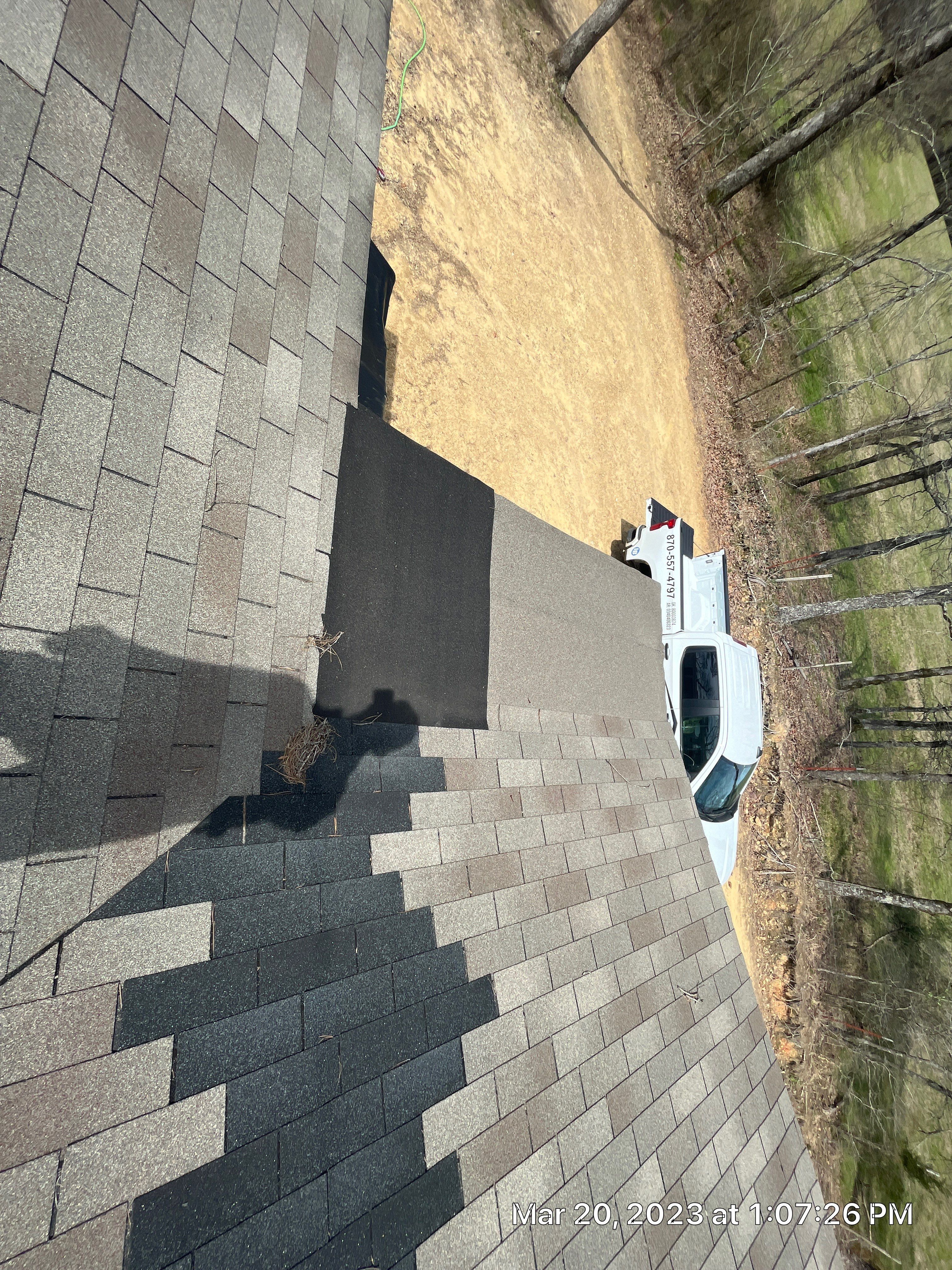 Residential Roofing Installation using 26 Gauge Colored Panels by Hostetler Roofing