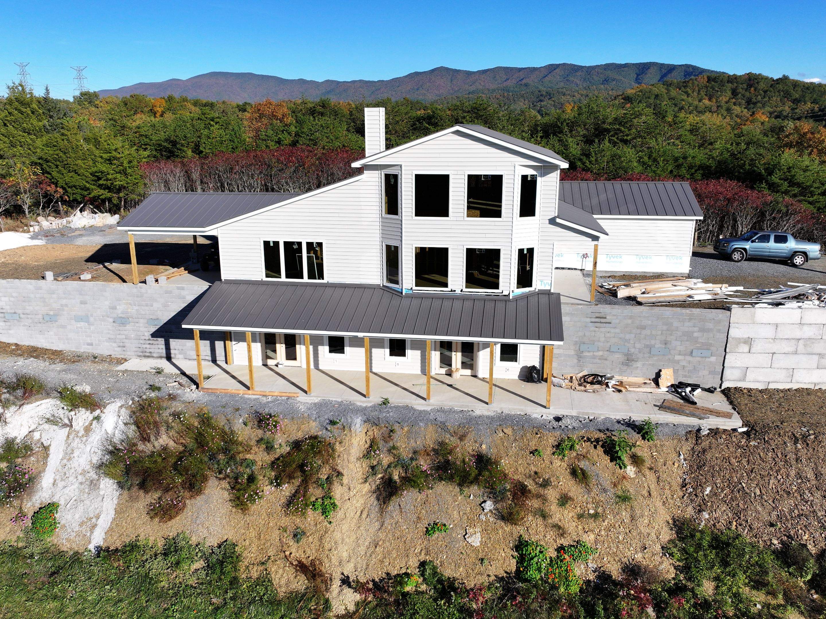 Textured Charcoal Gray Standing Seam by Omnia Roofing