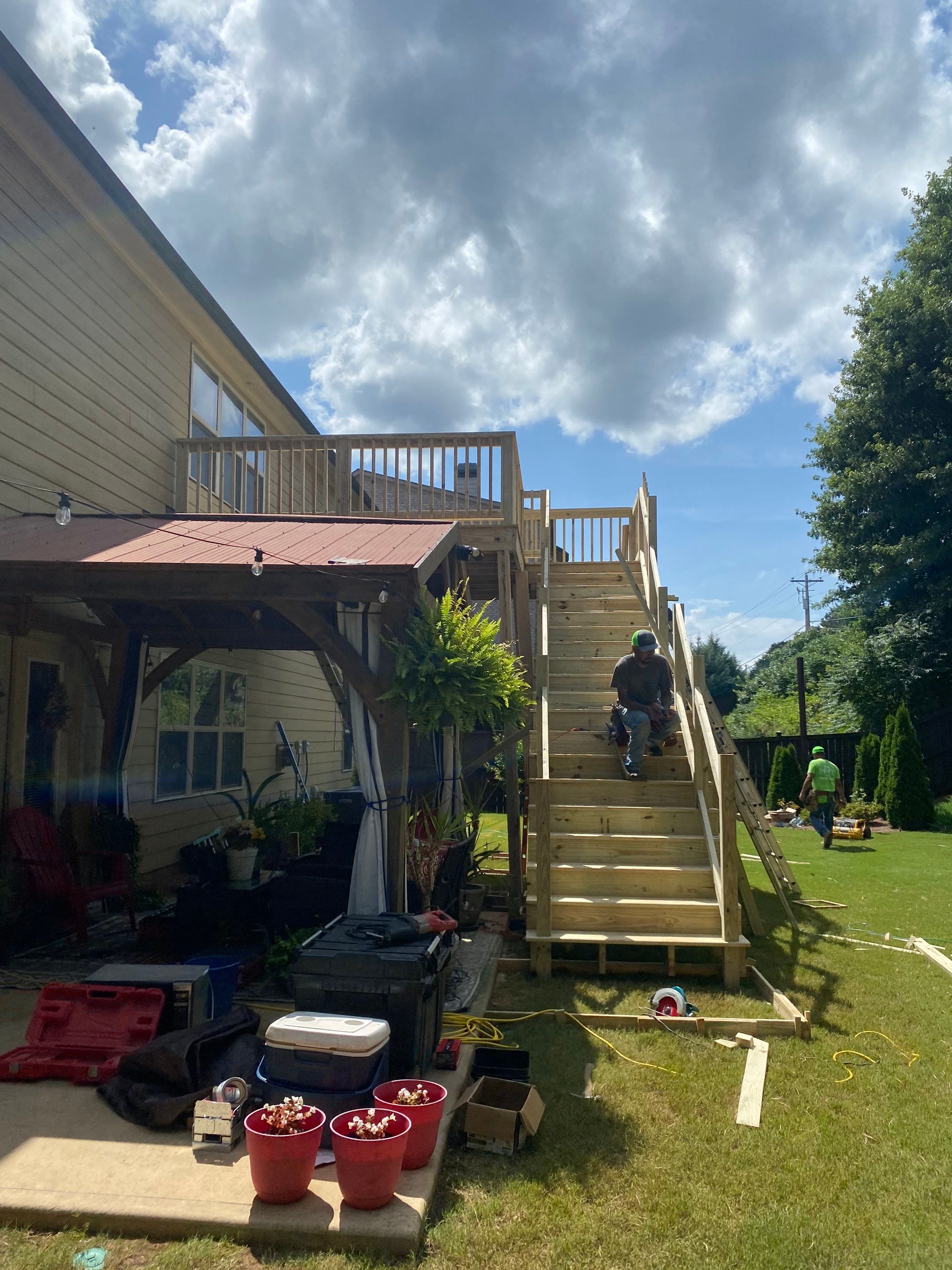 Pressure-Treated Wood Deck and Staircase Construction in Cumming, Georgia by Swift Home Renovations