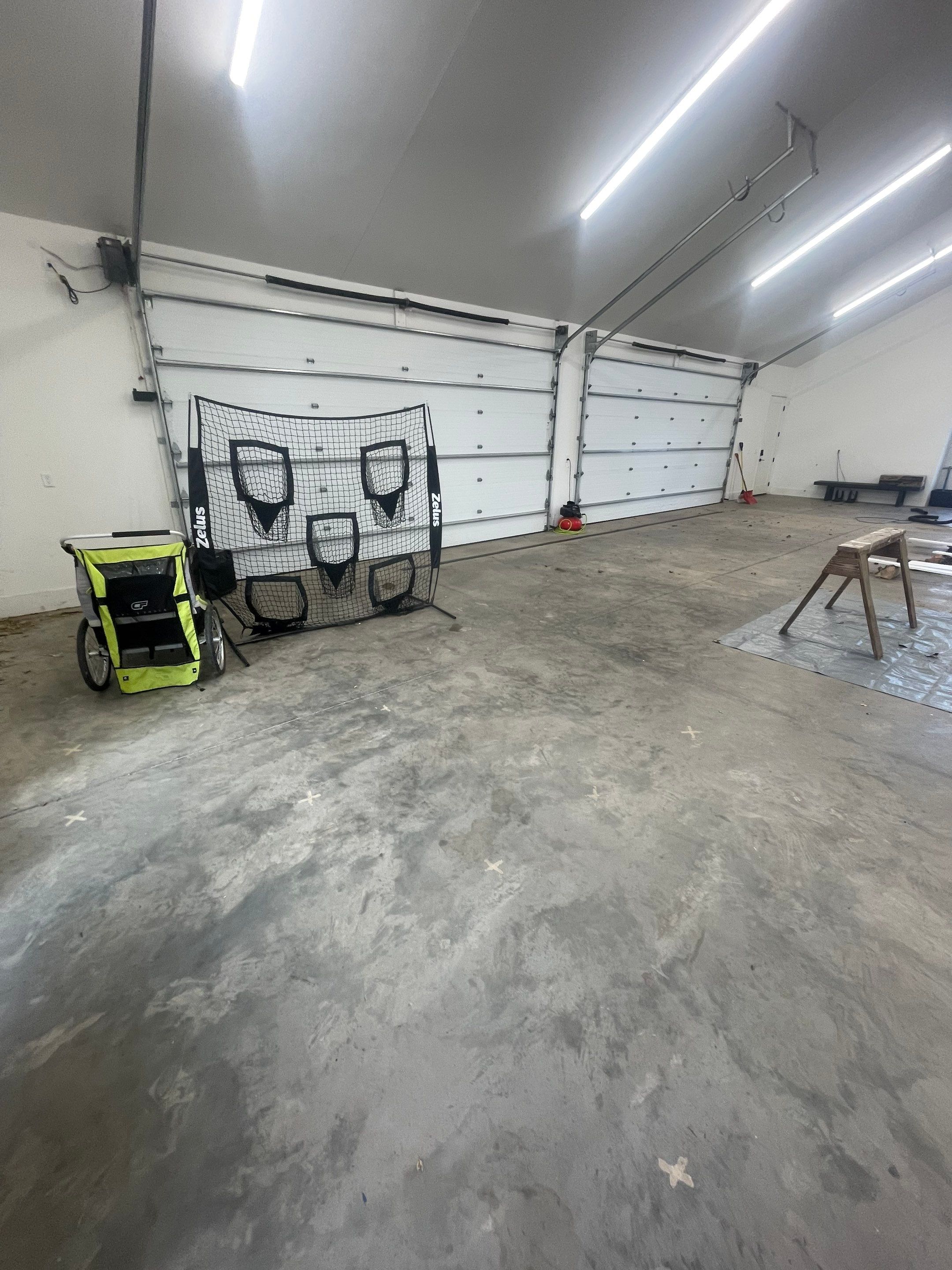 Epoxy Flake Garage Floor and Stair Coating in Sioux Falls by Select Painting, Coatings & Garage Cabinets