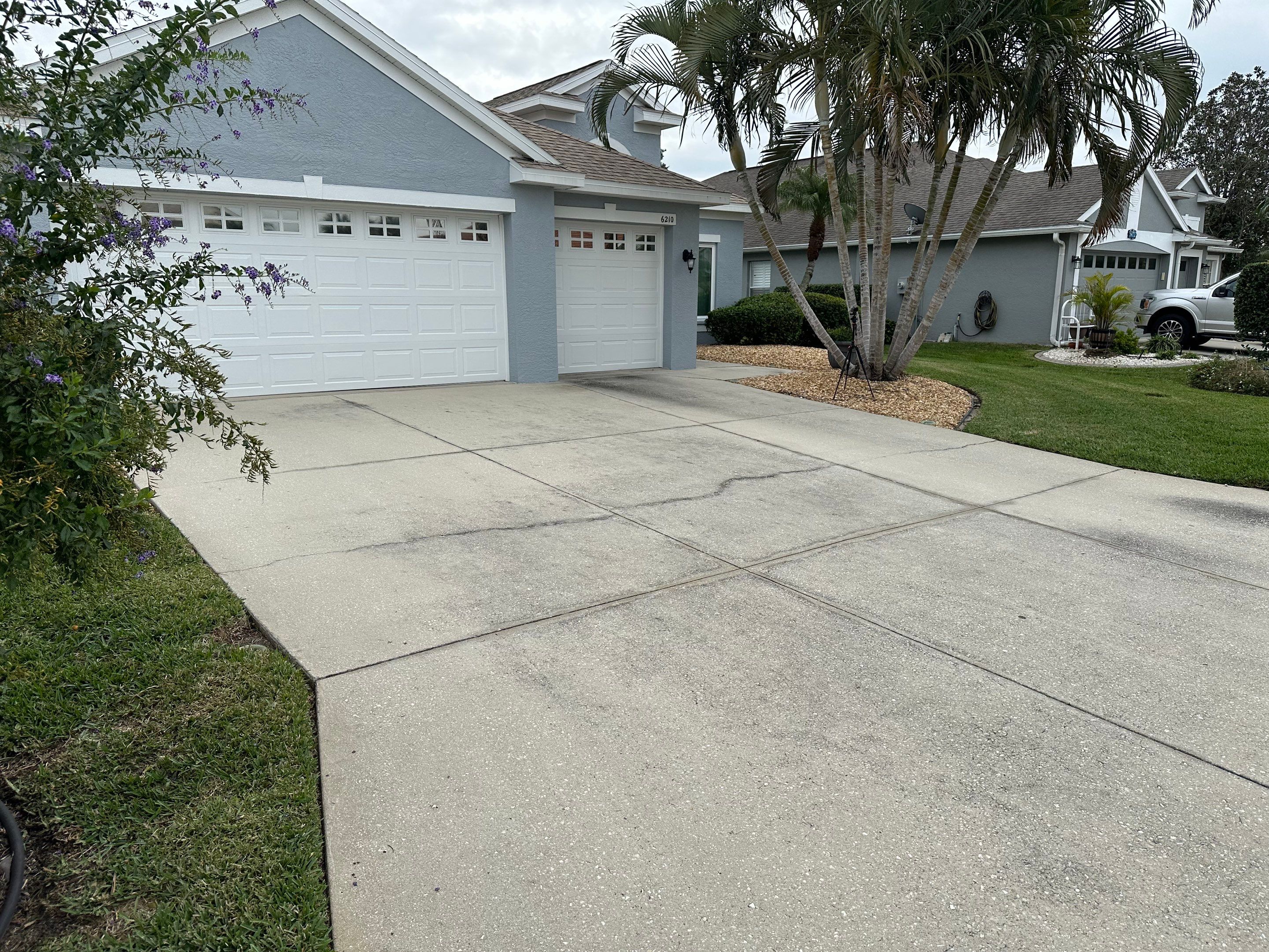 Concrete Driveway, Entryway & Street Curbing Cleaning in Fairways at Imperial Lakes, Palmetto, FL | Sunshine AquaWash by Sunshine AquaWash