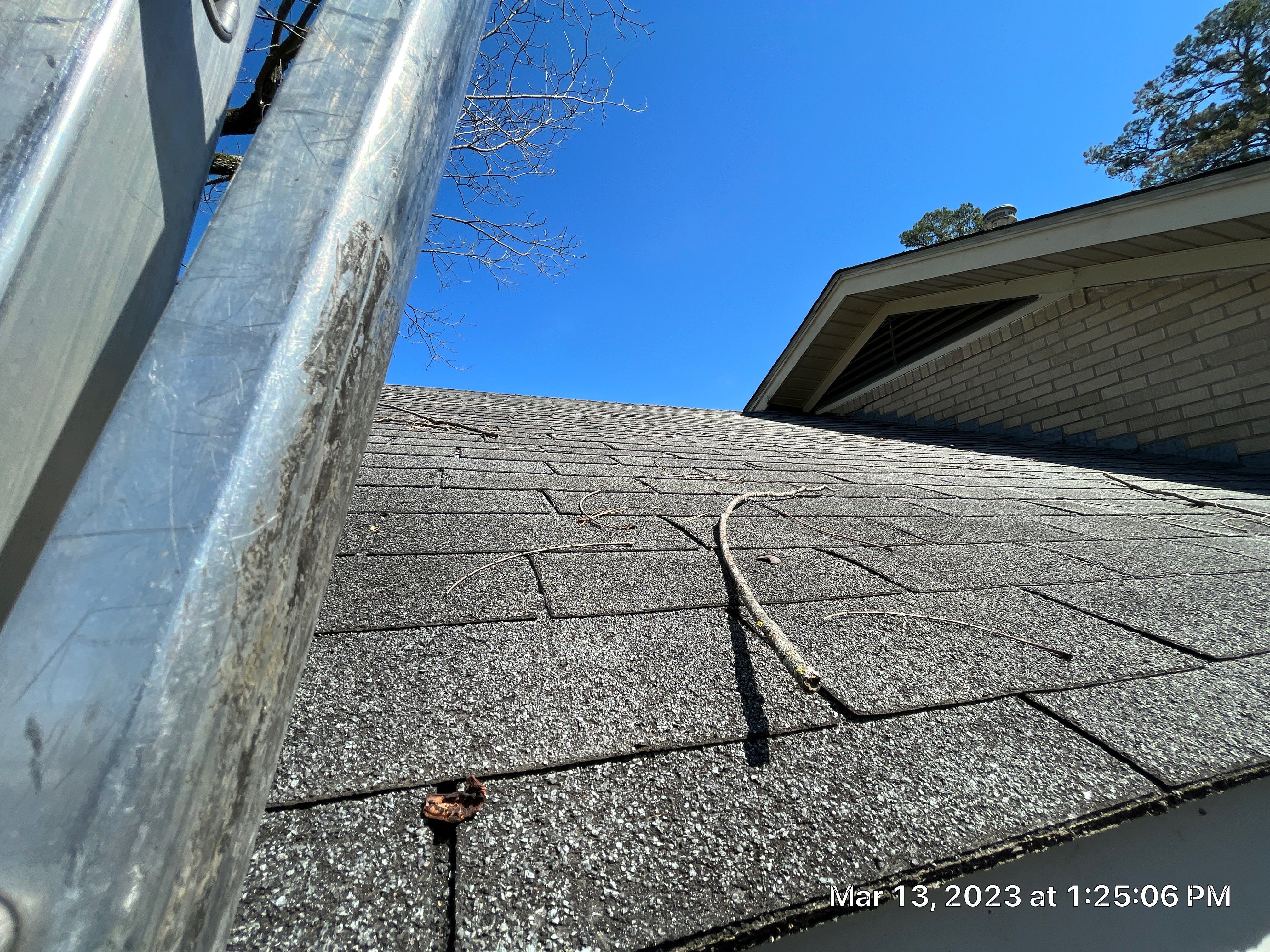 Residential Roofing Installation using 26 Gauge Colored Panels by Hostetler Roofing