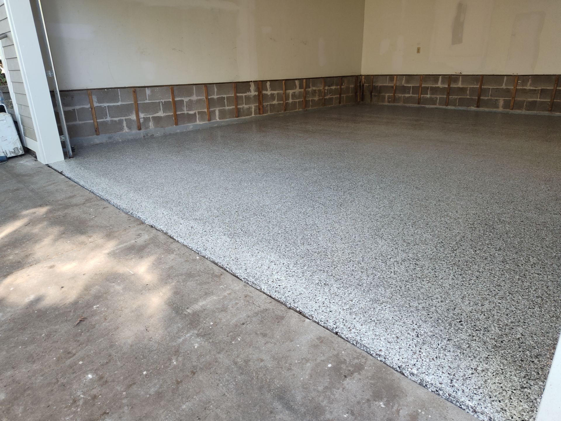 Alair Homeshow Remodel - Utility Room & Garage Coating by Revival Concrete Coatings