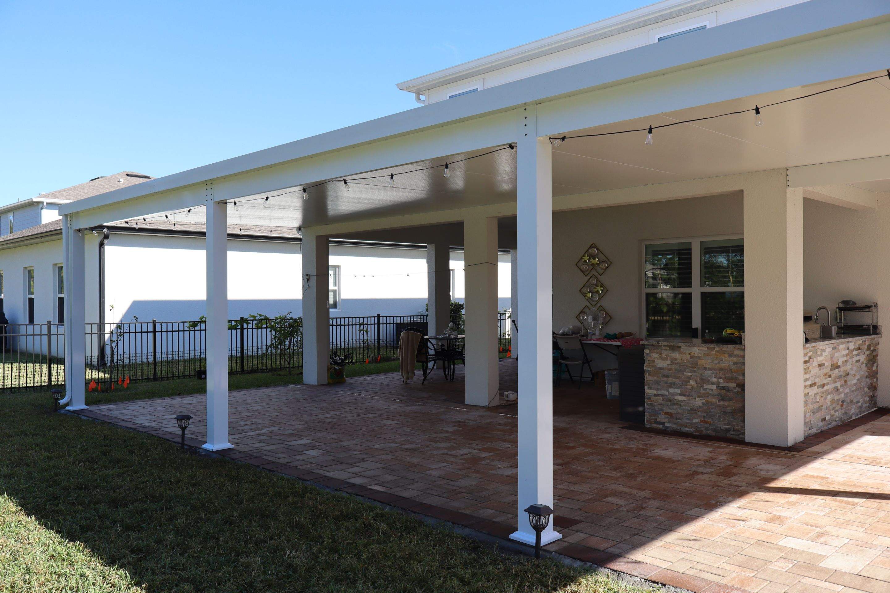 Patio cover with kitchen by Orlando pergolas 