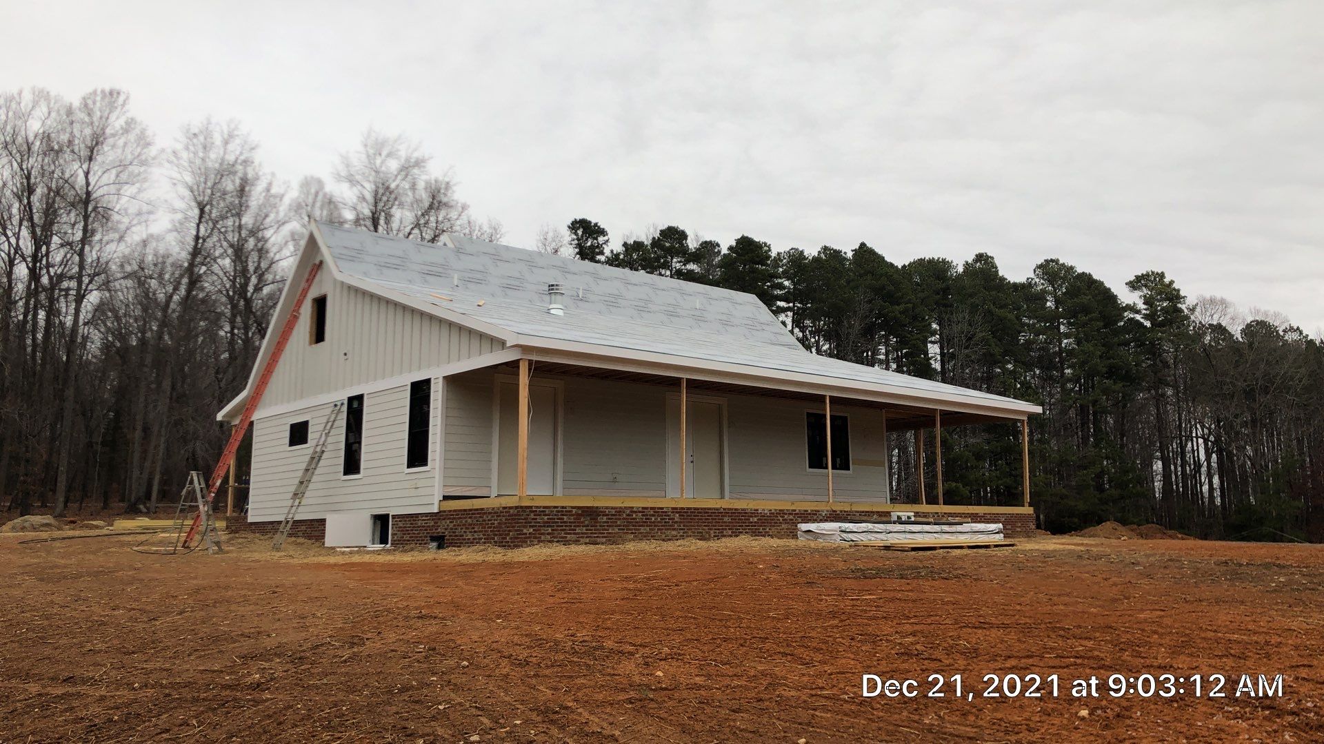 Custom Home Metal Roof Installation by Just In Time Roofing and Restoration