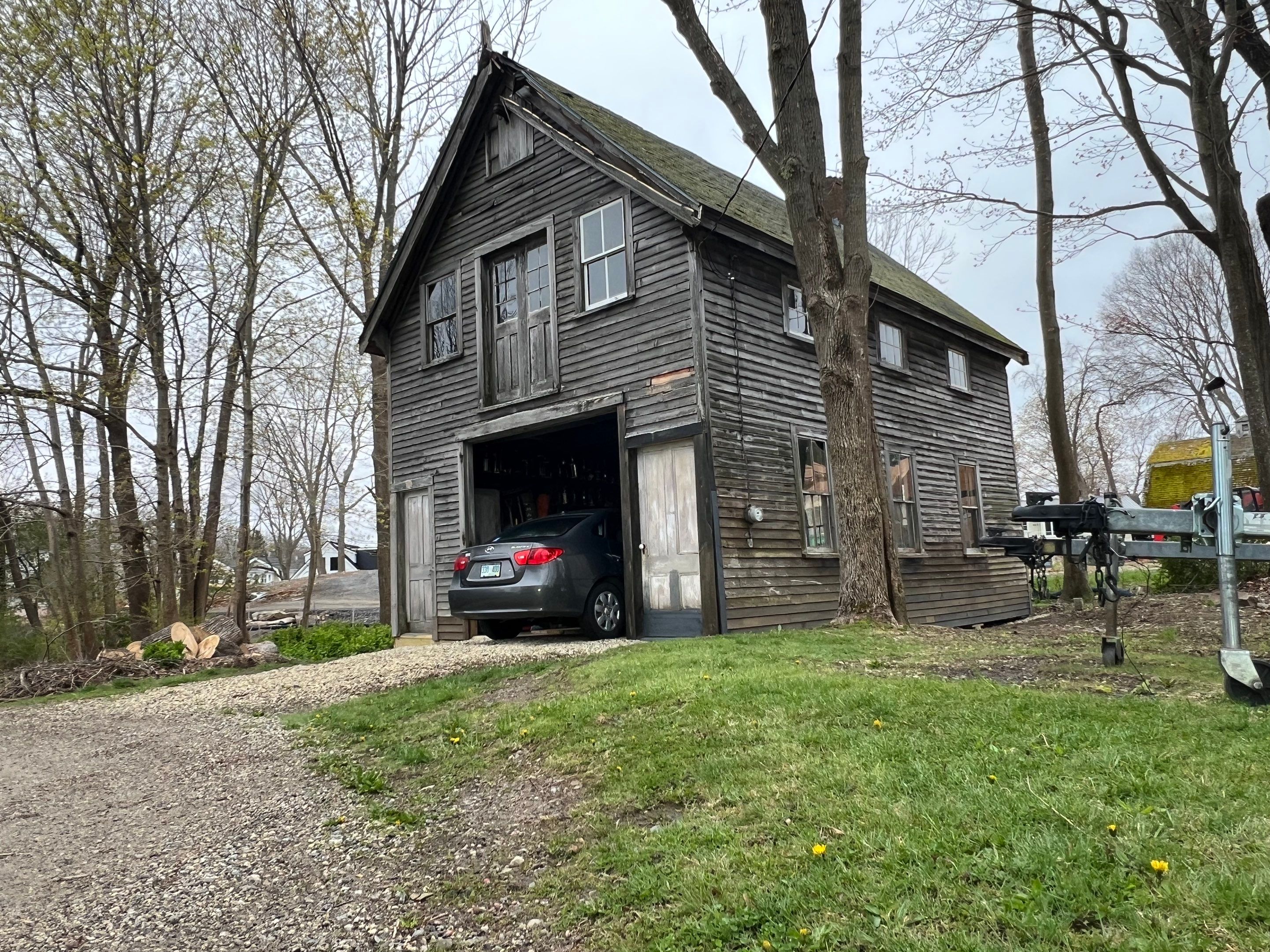 Just the beginning of a barn restoration in New Castle by Tall pine roofing