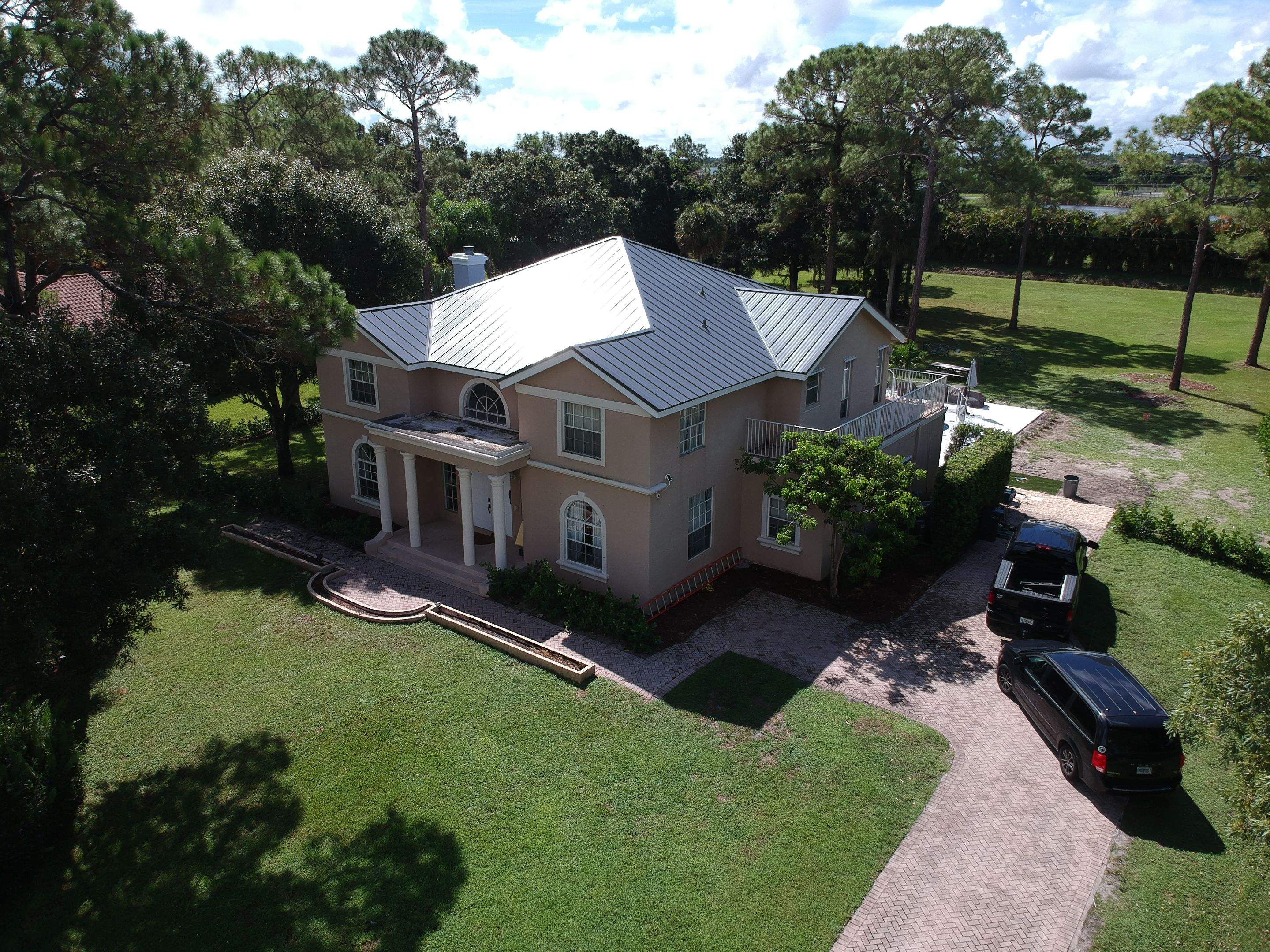 Residential Roofing Installation using 1" Nail strip metal roof by BLUES BROTHERS ROOFING