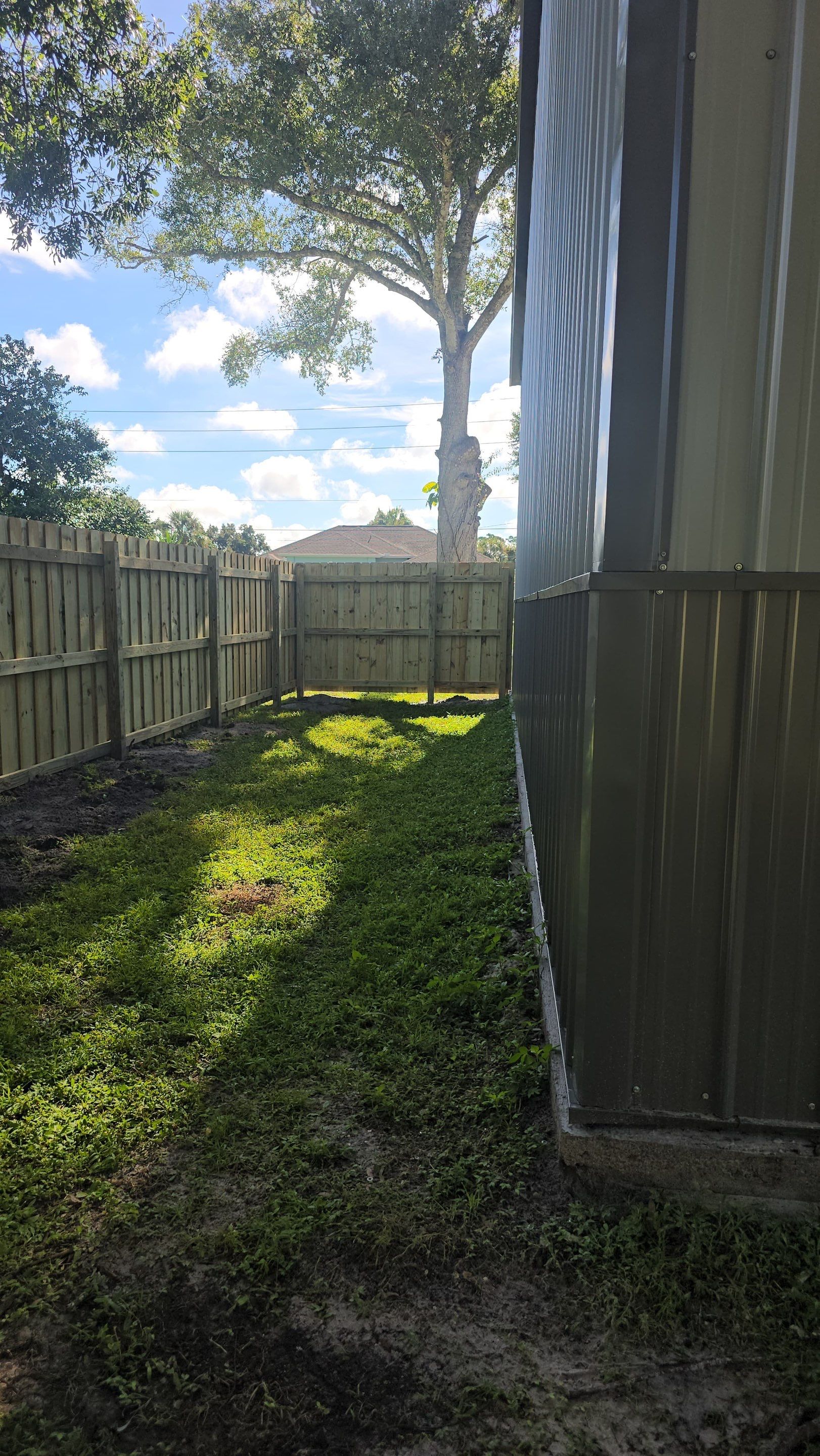 Pressure-Treated Wood Privacy Fence and Gate Installation in North Port by True Fence LLC