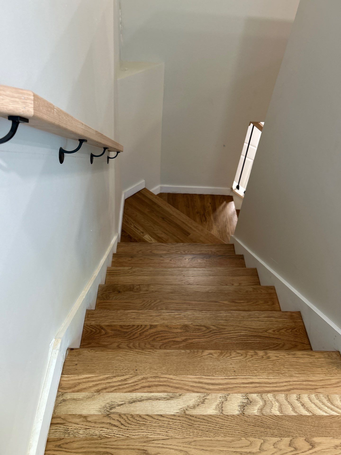 Remodel with existing and new white oak by Footprints Floors of East Atlanta