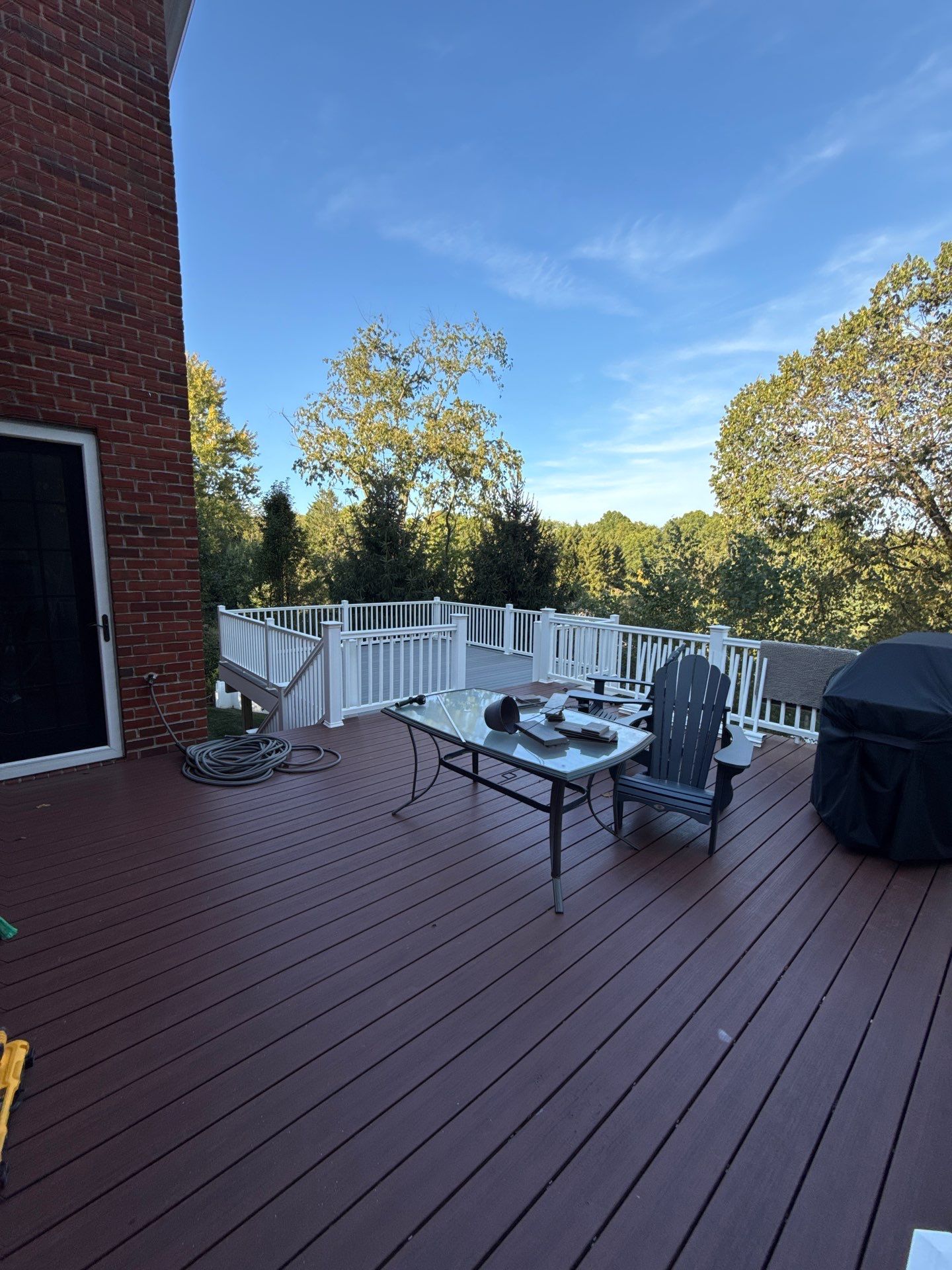 Deck extension  by Cousins Roofing Siding & Decks