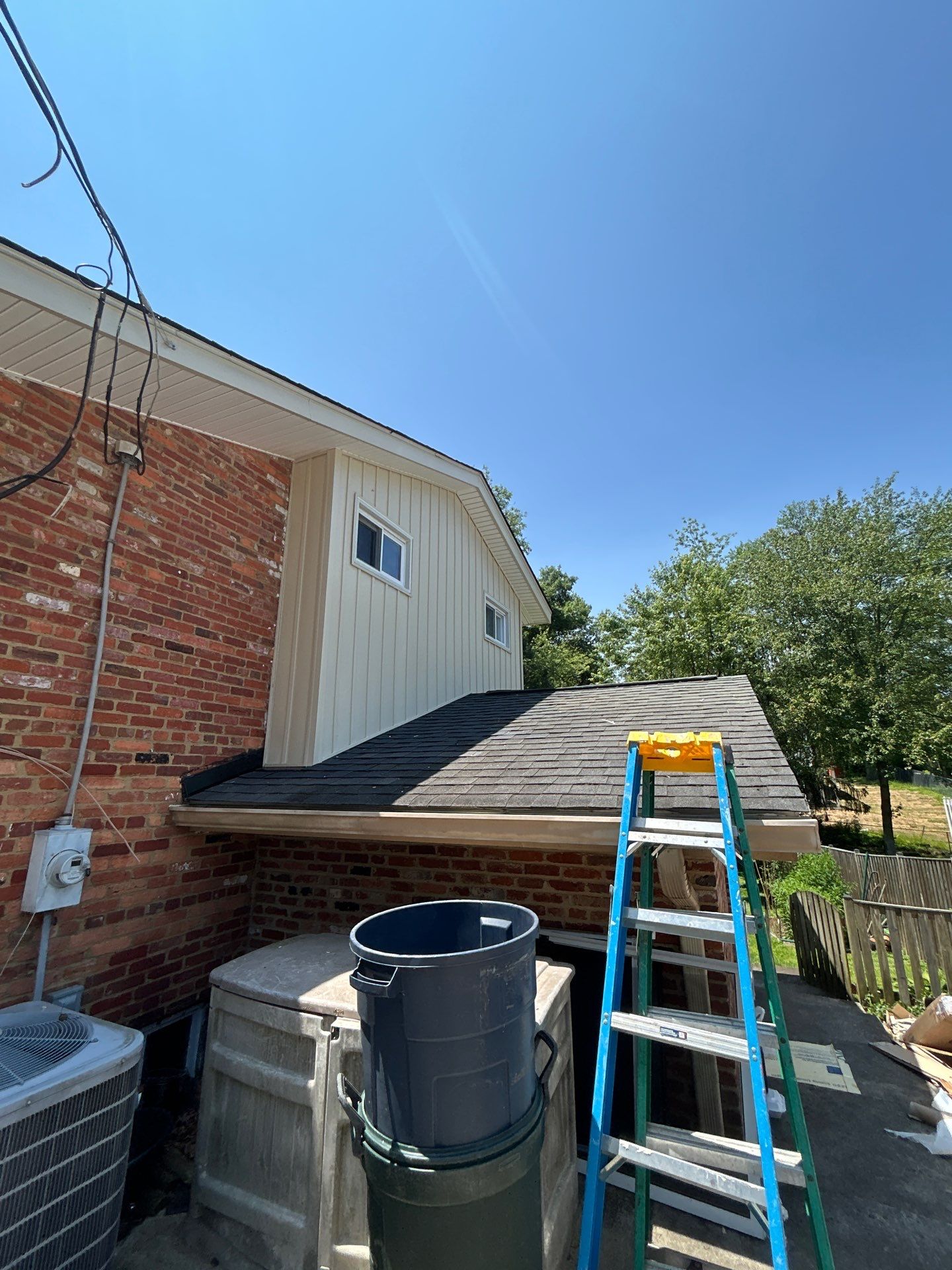Fairfax: Residential Siding Replacement with CertainTeed 8" Board and Batten Siding in Desert Tan by RM Banning, Inc.