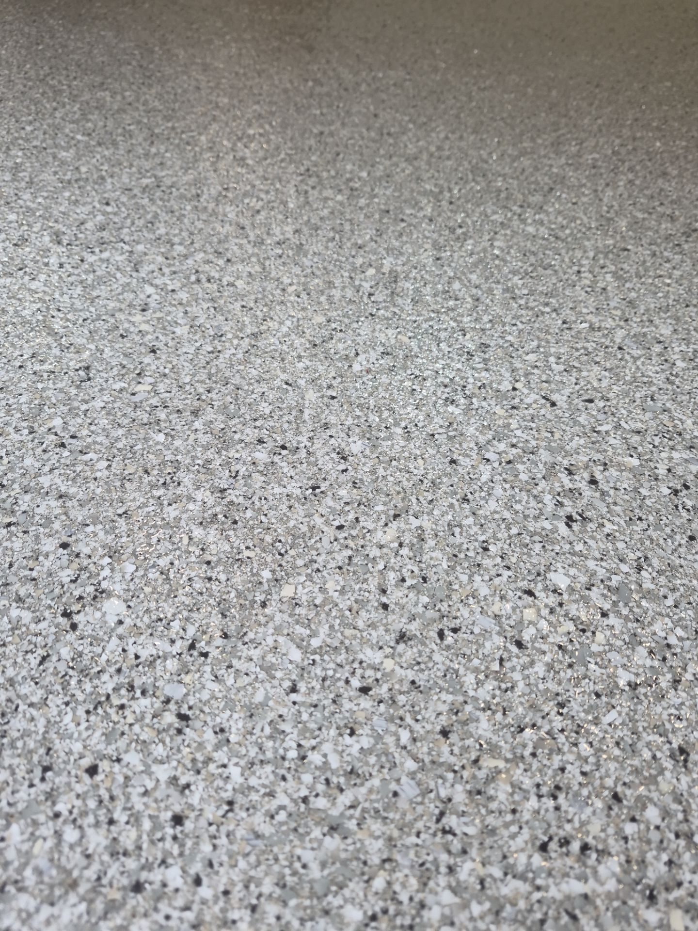Walla Walla Garage Floor Transformation Using Limestone Hybrid Coating by Croc Coatings, LLC