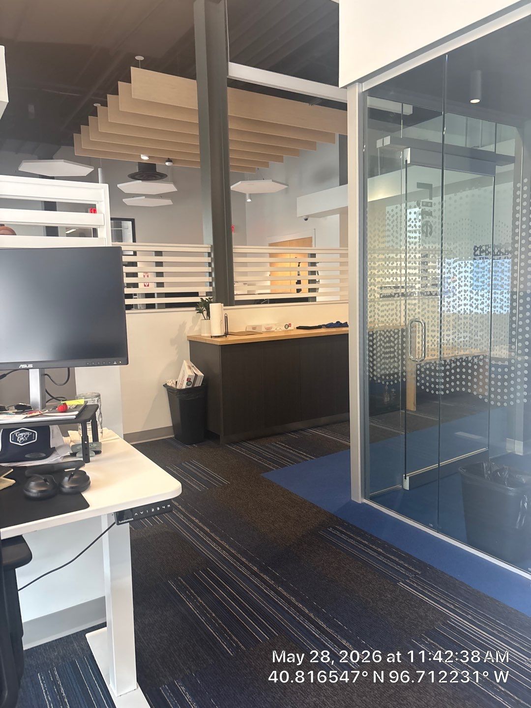 Modern Office Remodel with Acoustic Baffles and Glass Partitions by CompanyCam Sales Demo