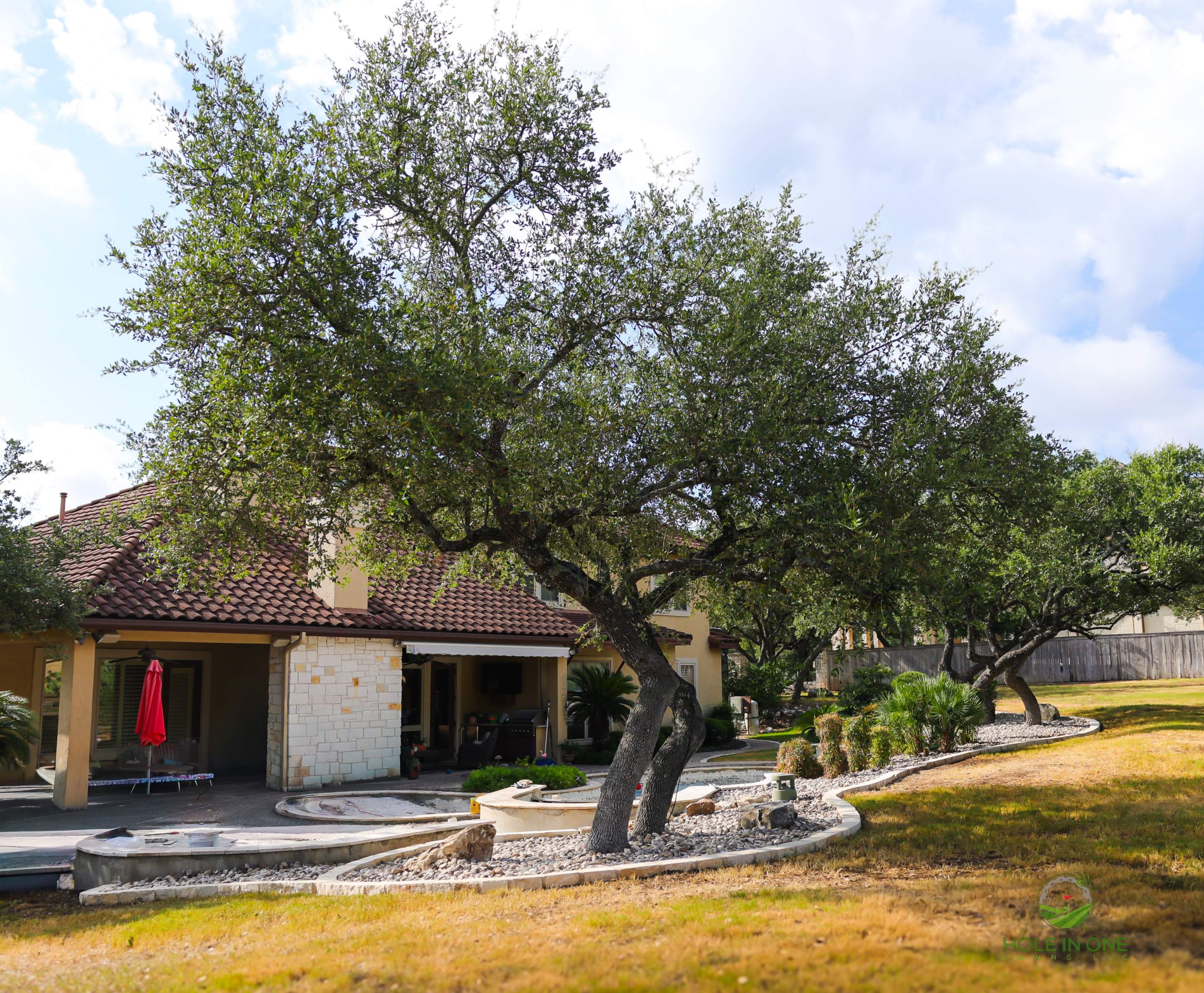 The Heights Of Stone Oaks, San Antonio Tx. by Hole In One Lawns, LLC