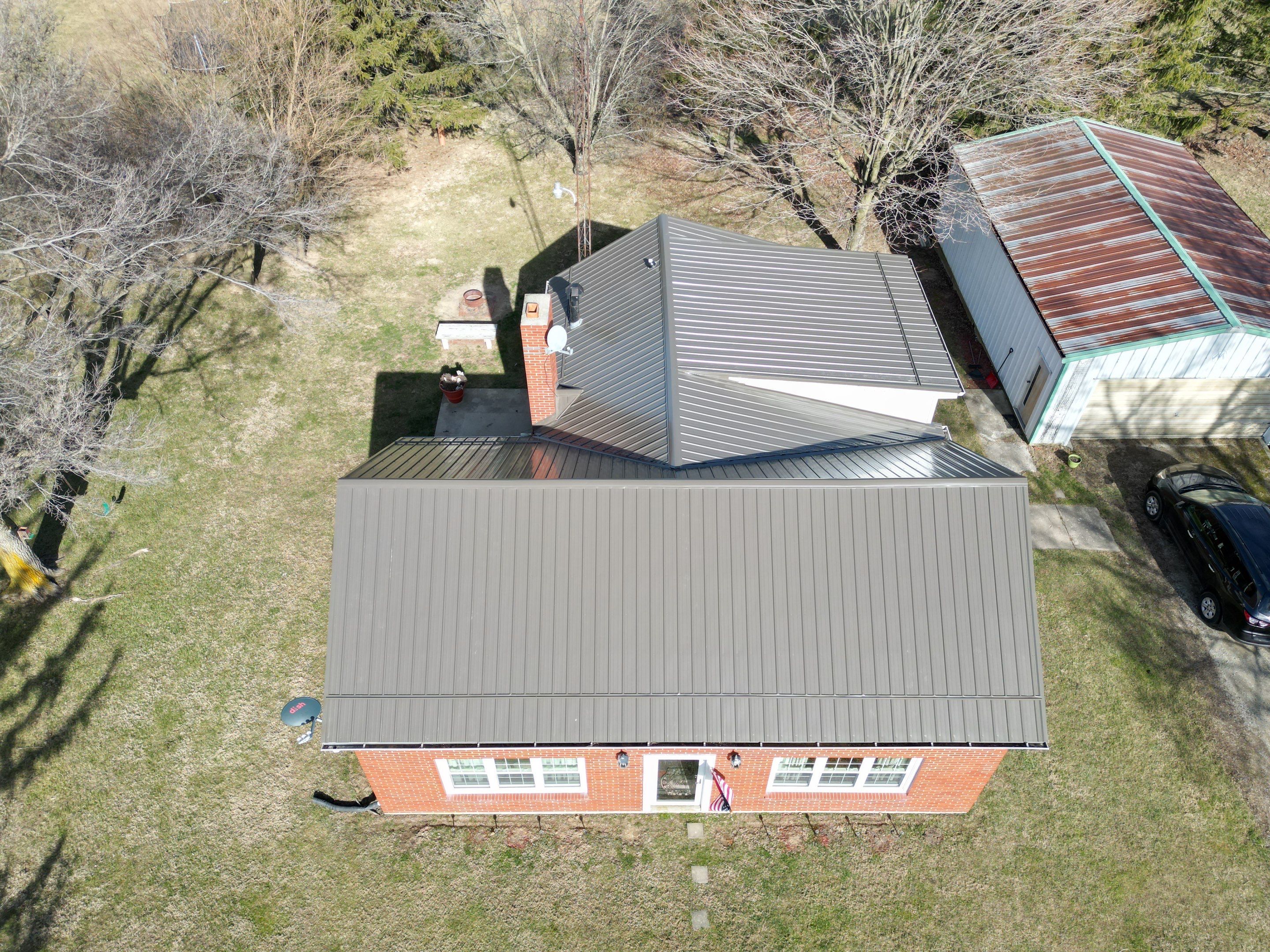 Residential Roofing Installation using Performance Panel Metal - Burnished Slate by RoofX 