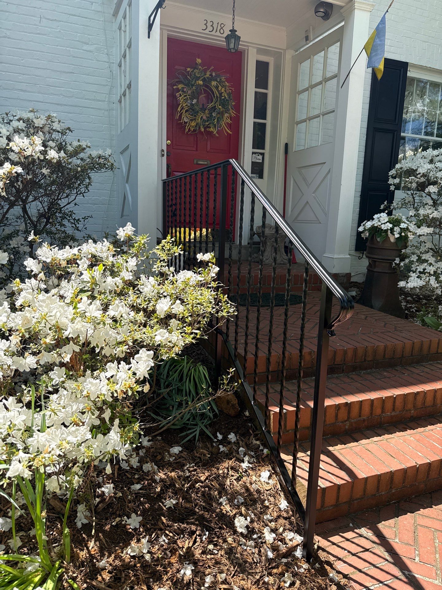 Custom Wrought Iron Handrails for Herringbone Brick Stairs in DC by Capitol Iron Works