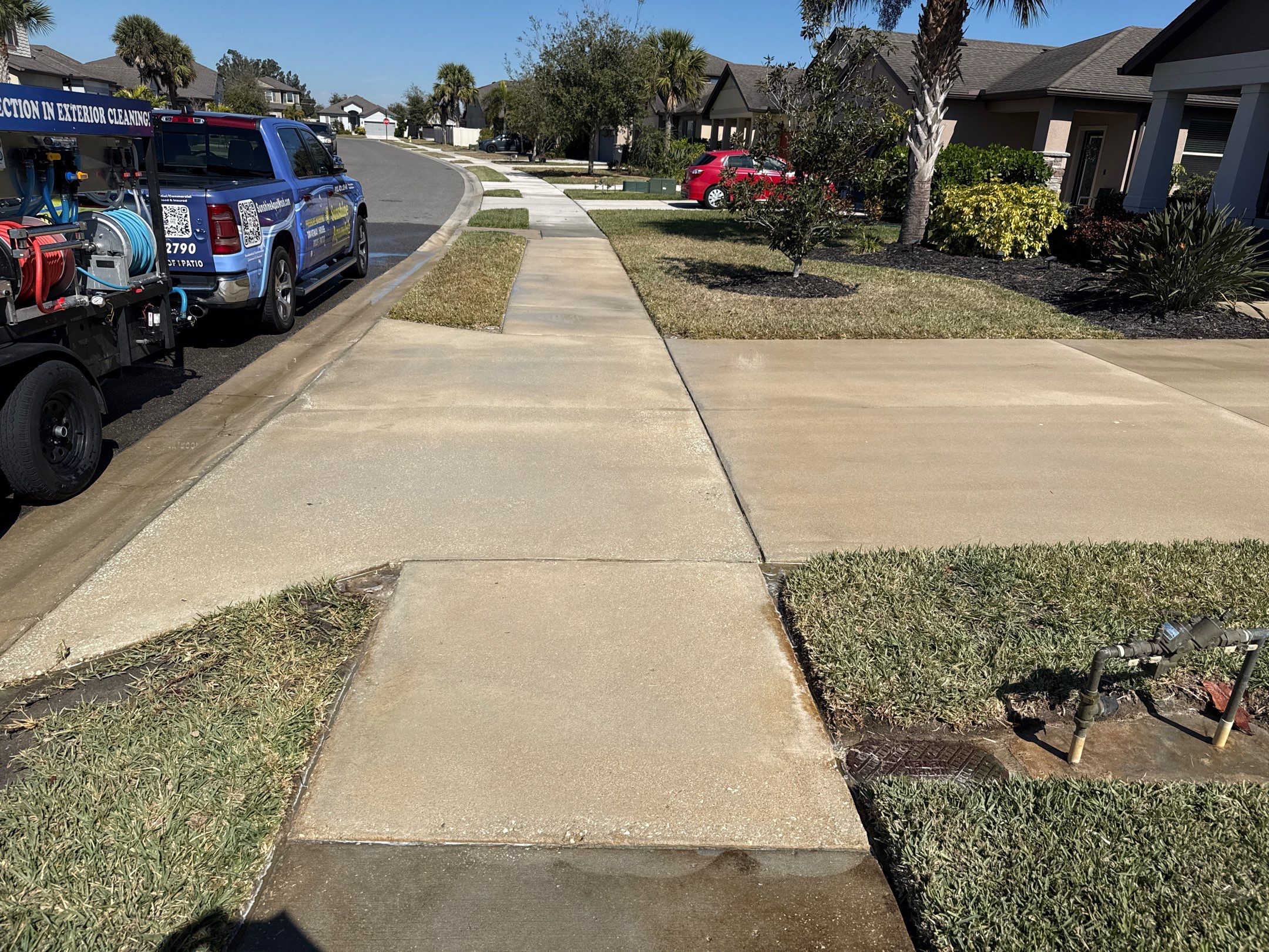2-Car Concrete Driveway & Sidewalk Cleaning in Trevesta – Palmetto, FL by Sunshine AquaWash