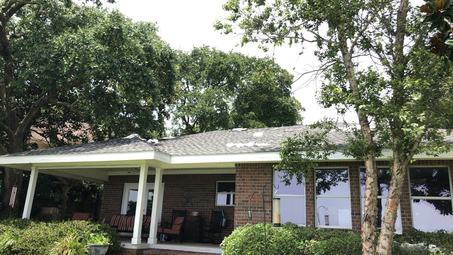 Residential Roofing Installation using Roof Replacement by American Roofing & Construction LLC